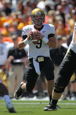 DENVER - SEPTEMBER 04:  Quarterback Tyler Hansen  #9 of the Colorado Buffaloes drops back to pass against the Colorado State Rams in the Rocky Mountain Showdown at INVESCO Field at Mile High on September 4, 2010 in Denver, Colorado. Colorado was awarded t