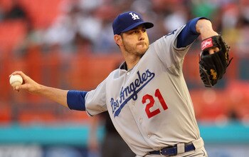 MIAMI GARDENS, FL - APRIL 25:  Jon Garland #21 of the Los Angeles Dodgers pitches during a game against the Florida Marlins at Sun Life Stadium on April 25, 2011 in Miami Gardens, Florida.  (Photo by Mike Ehrmann/Getty Images)