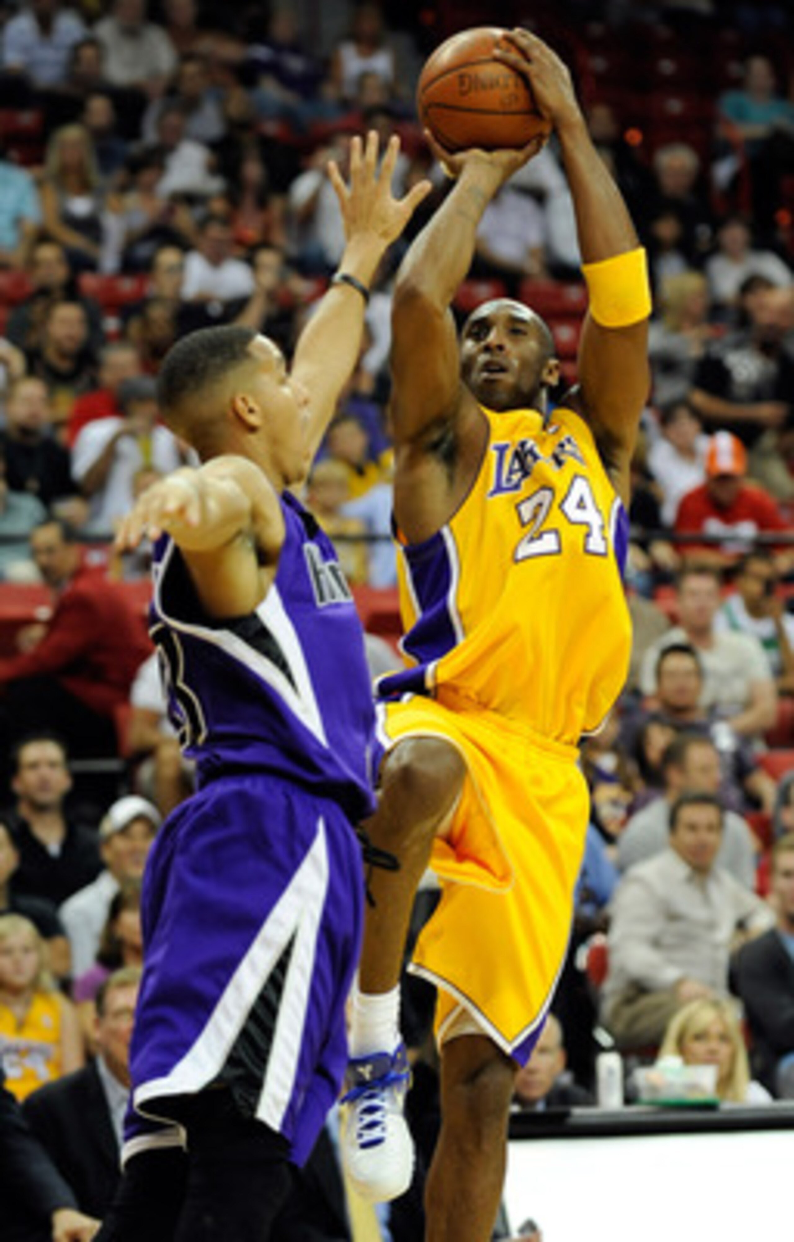 LAS VEGAS - OCTOBER 15:  Kobe Bryant #24 of the Los Angeles Lakers shoots over Kevin Martin #23 of the Sacramento Kings during their preseason game at the Thomas & Mack Center October 15, 2009 in Las Vegas, Nevada. NOTE TO USER: User expressly acknowledge