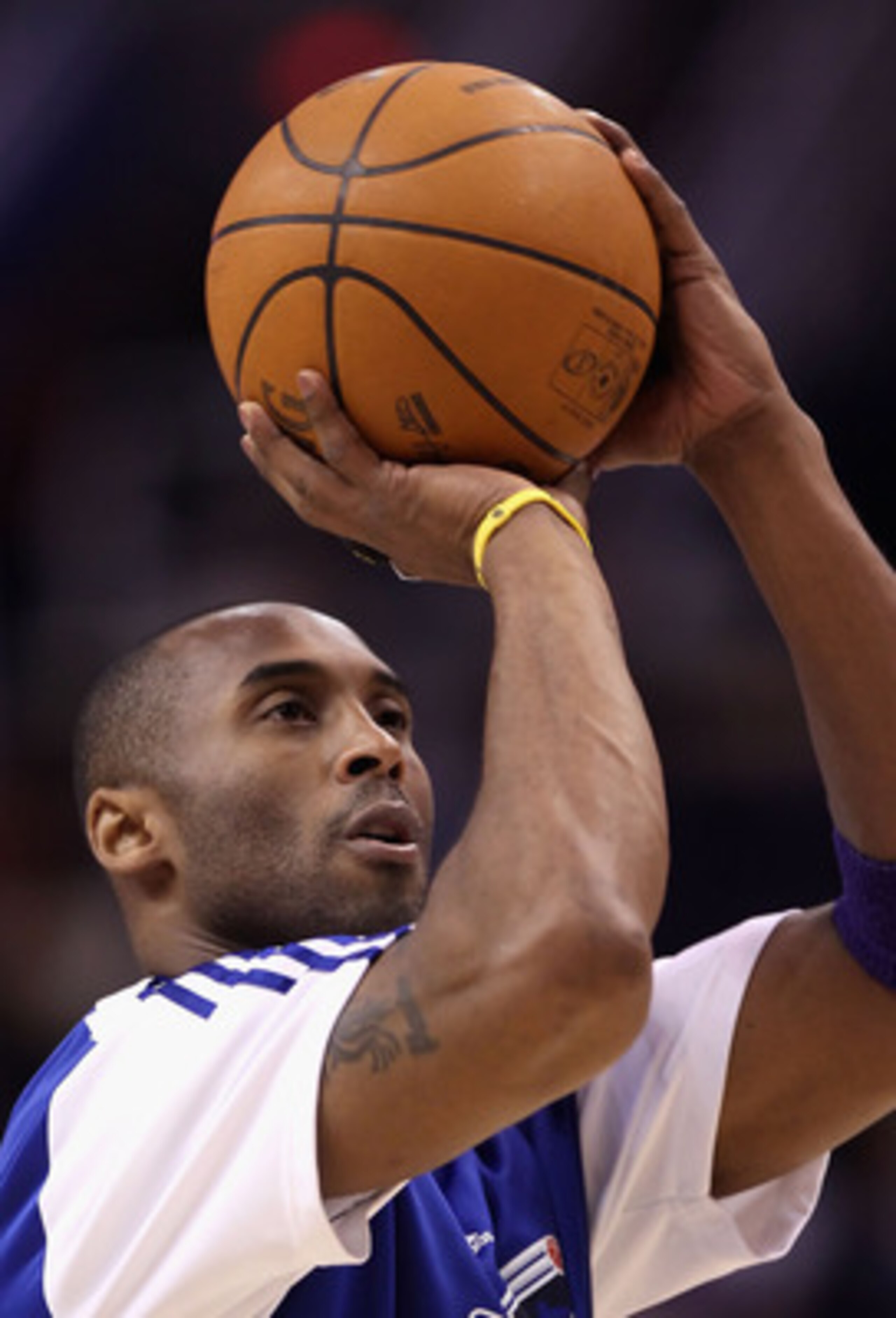 PHOENIX, AZ - JANUARY 05:  Kobe Bryant #24 of the Los Angeles Lakers warms up before the NBA game against the Phoenix Suns at US Airways Center on December 23, 2011 in Phoenix, Arizona. The Lakers defeated the Suns 99-95.  NOTE TO USER: User expressly ack