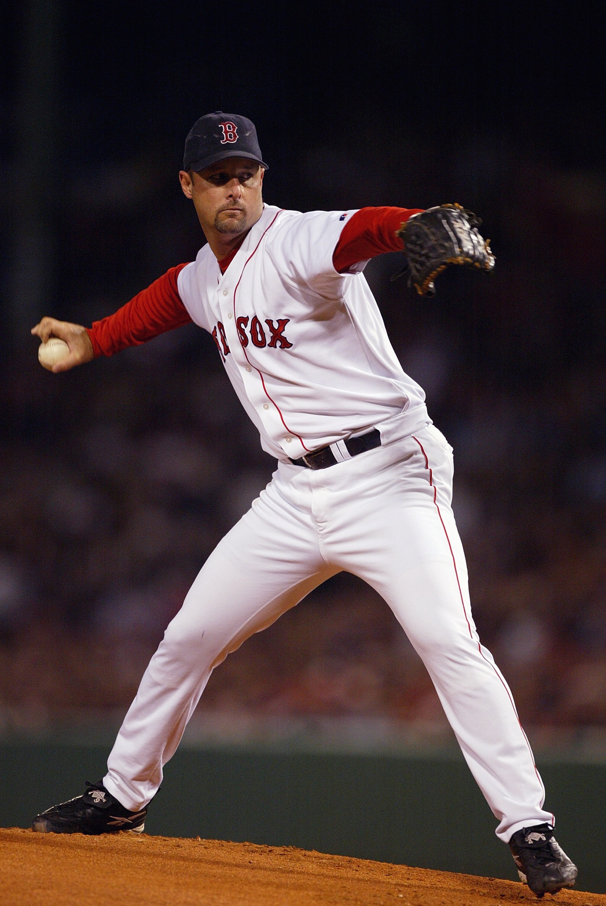 BOSTON - OCTOBER 13:  Starter Tim Wakefield #49 of the Boston Red Sox pitches during game four of the American League Championship Series against the New York Yankees on October 13, 2003 at Fenway Park in Boston, Massachusettes. The Red Sox won 3-2. (Phot