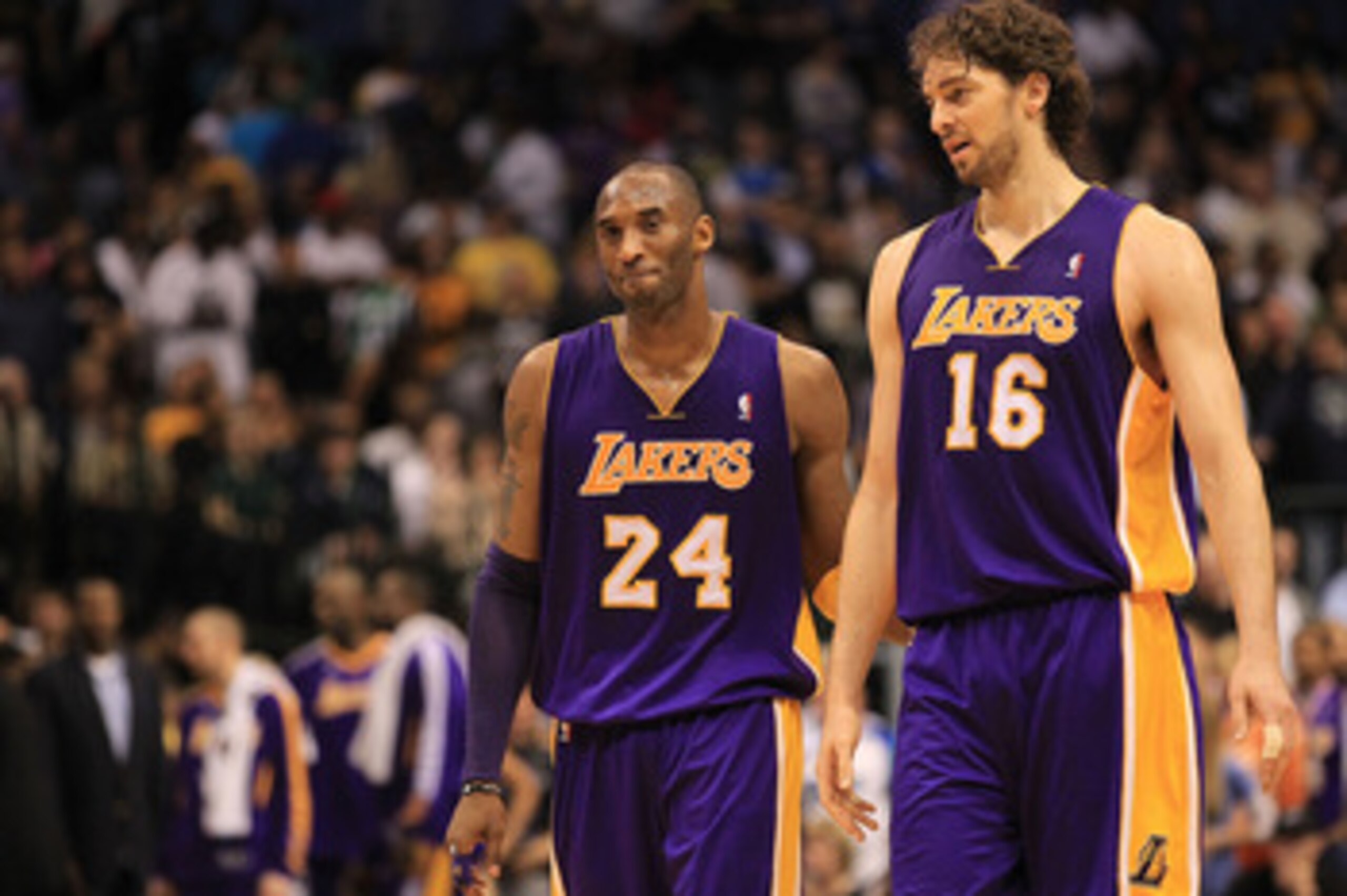 DALLAS, TX - MARCH 12:  Kobe Bryant #24 and Pau Gasol #16 of the Los Angeles Lakers react after a 96-91 win against the Dallas Mavericks at American Airlines Center on March 12, 2011 in Dallas, Texas.  NOTE TO USER: User expressly acknowledges and agrees 