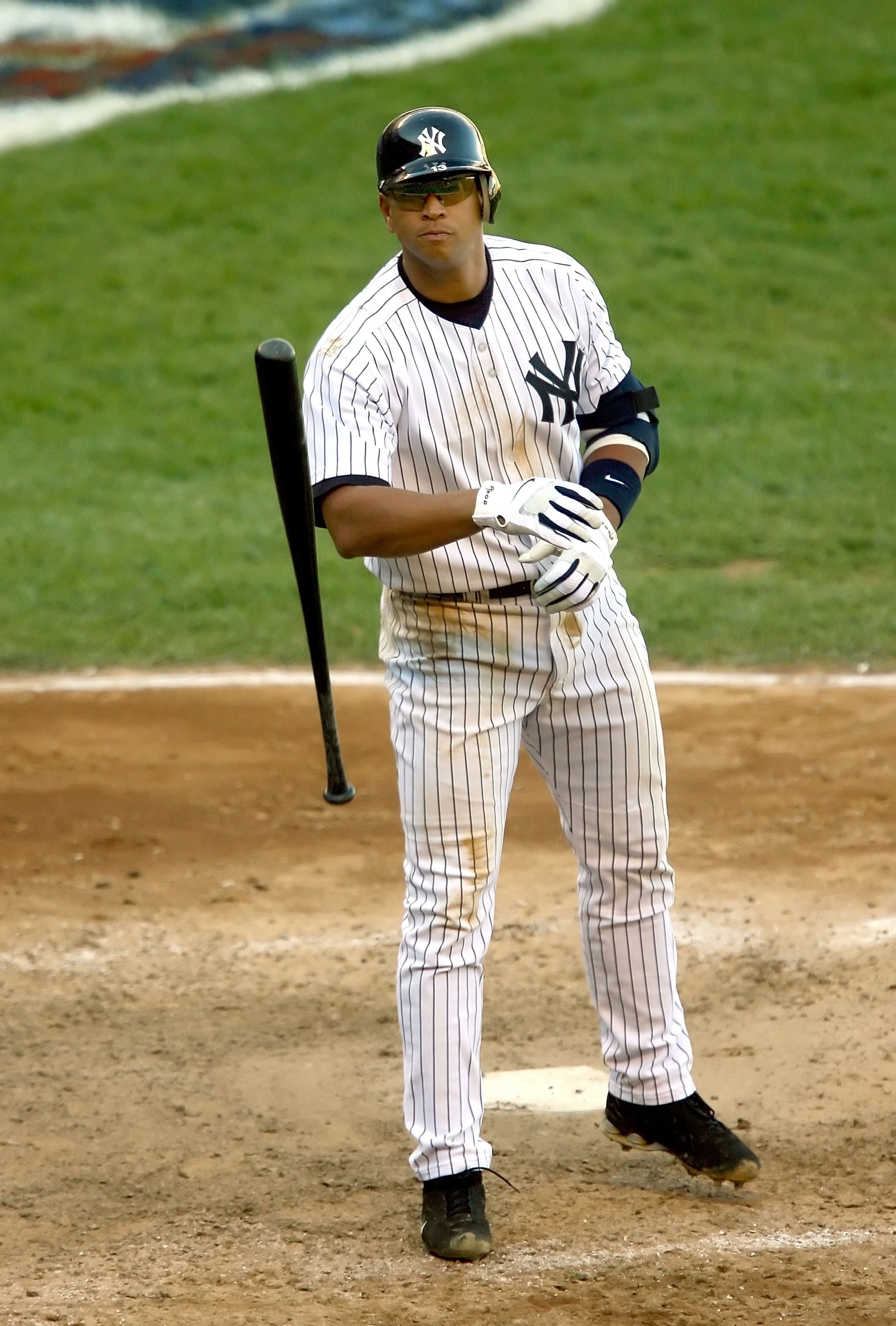 NEW YORK - OCTOBER 05:  Alex Rodriguez #13 of the New York Yankees throws his bat after being struck out in the eighth inning against the Detroit Tigers in Game Two of the American League Division Series on October 5, 2006 at Yankee Stadium in the Bronx B