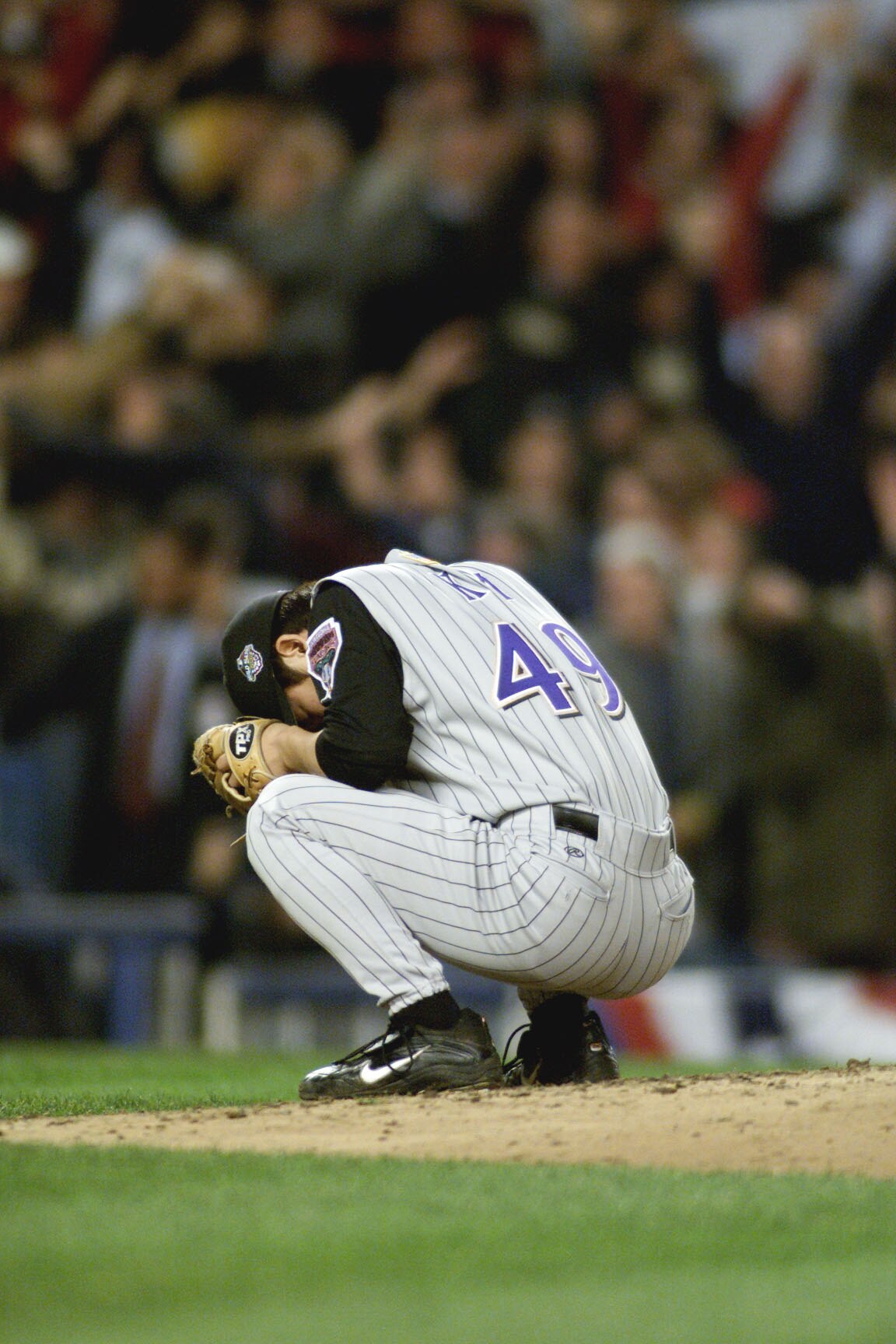 1 Nov 2001:  Byung-Hyun Kim #49 relief pitcher for Arizona Diamondbacks reacts to giving up New York Yankees third baseman  Scott Brosius'' game tying two run home run with two outs in the bottom of the ninth in game five of the 2001 World Series versus t