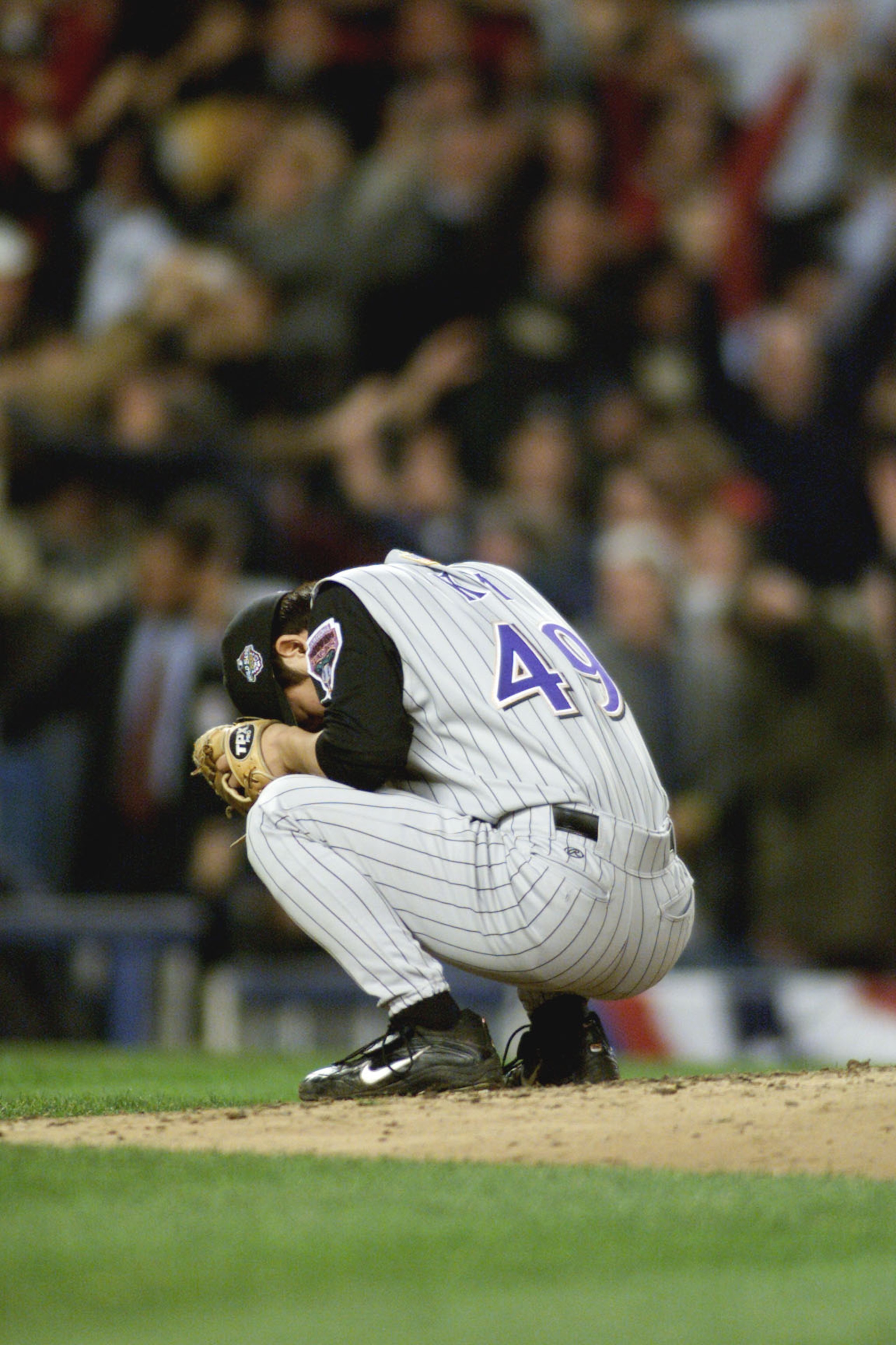 1 Nov 2001:  Byung-Hyun Kim #49 relief pitcher for Arizona Diamondbacks reacts to giving up New York Yankees third baseman  Scott Brosius'' game tying two run home run with two outs in the bottom of the ninth in game five of the 2001 World Series versus t