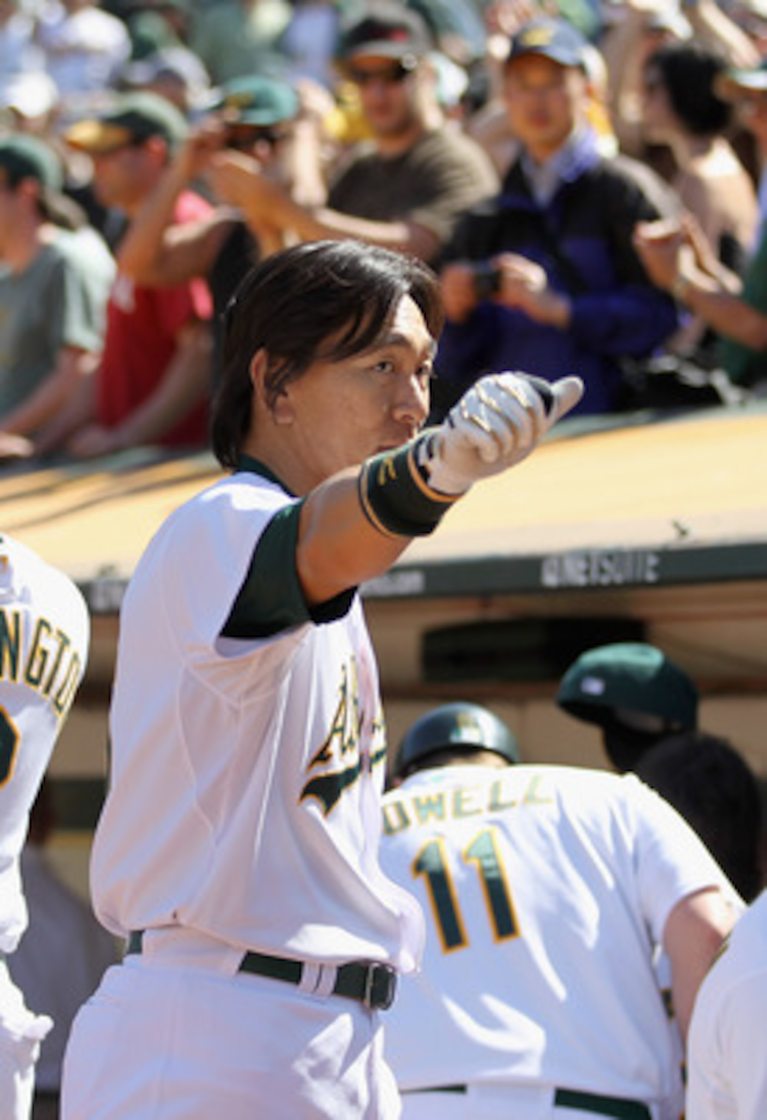 OAKLAND, CA - MAY 02:  Hideki Matsui #55 of the Oakland Athletics waves to the crowd after he hit a walk off home run to win the game in the tenth inning against the Texas Rangers at Oakland-Alameda County Coliseum on May 2, 2011 in Oakland, California.  