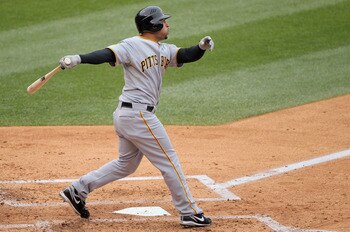 DENVER, CO - MAY 01:  Xavier Paul #38 of the Pittsburgh Pirates hits a two RBI triple off of starting pitcher Ubaldo Jimenez of the Colorado Rockies to give the Pirates a 3-0 lead in the second inning at Coors Field on May 1, 2011 in Denver, Colorado.  (P