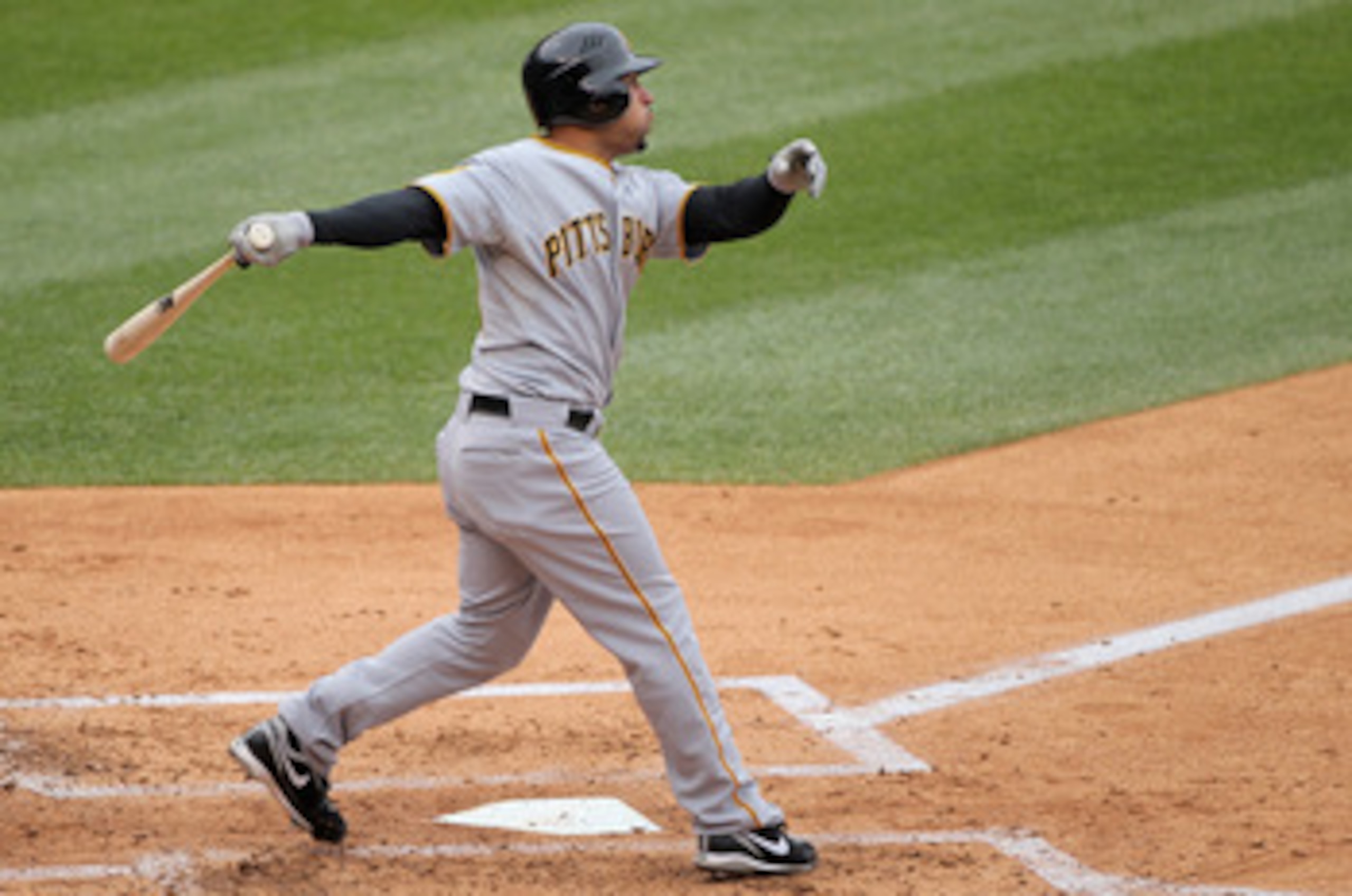 DENVER, CO - MAY 01:  Xavier Paul #38 of the Pittsburgh Pirates hits a two RBI triple off of starting pitcher Ubaldo Jimenez of the Colorado Rockies to give the Pirates a 3-0 lead in the second inning at Coors Field on May 1, 2011 in Denver, Colorado.  (P