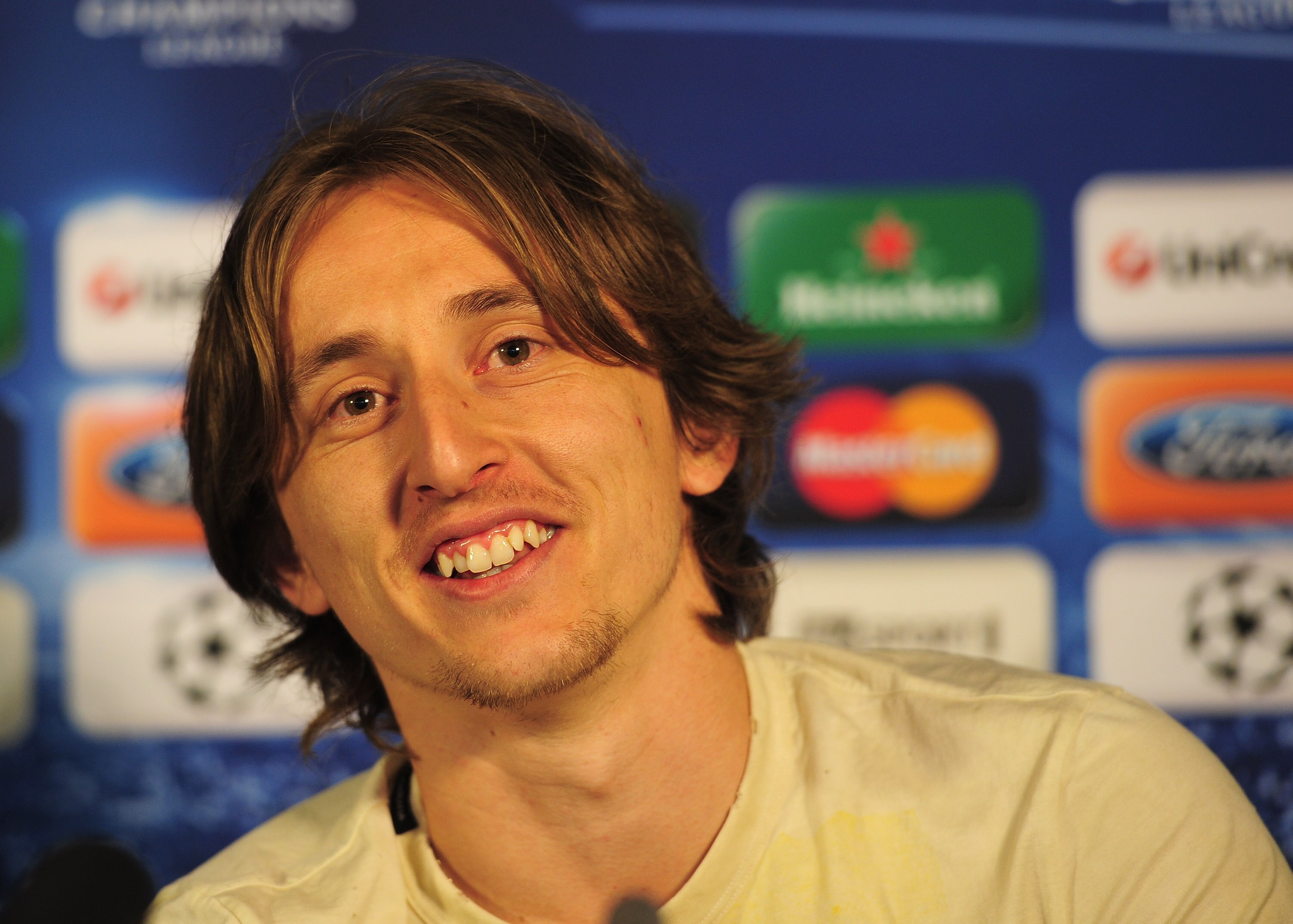 LONDON, ENGLAND - APRIL 12:  Luka Modric of Tottenham Hotspur talks to the media during a press conference on the eve of their UEFA Champions League quarter-final second leg match against Real Madrid at White Hart Lane on April 12, 2011 in London, England