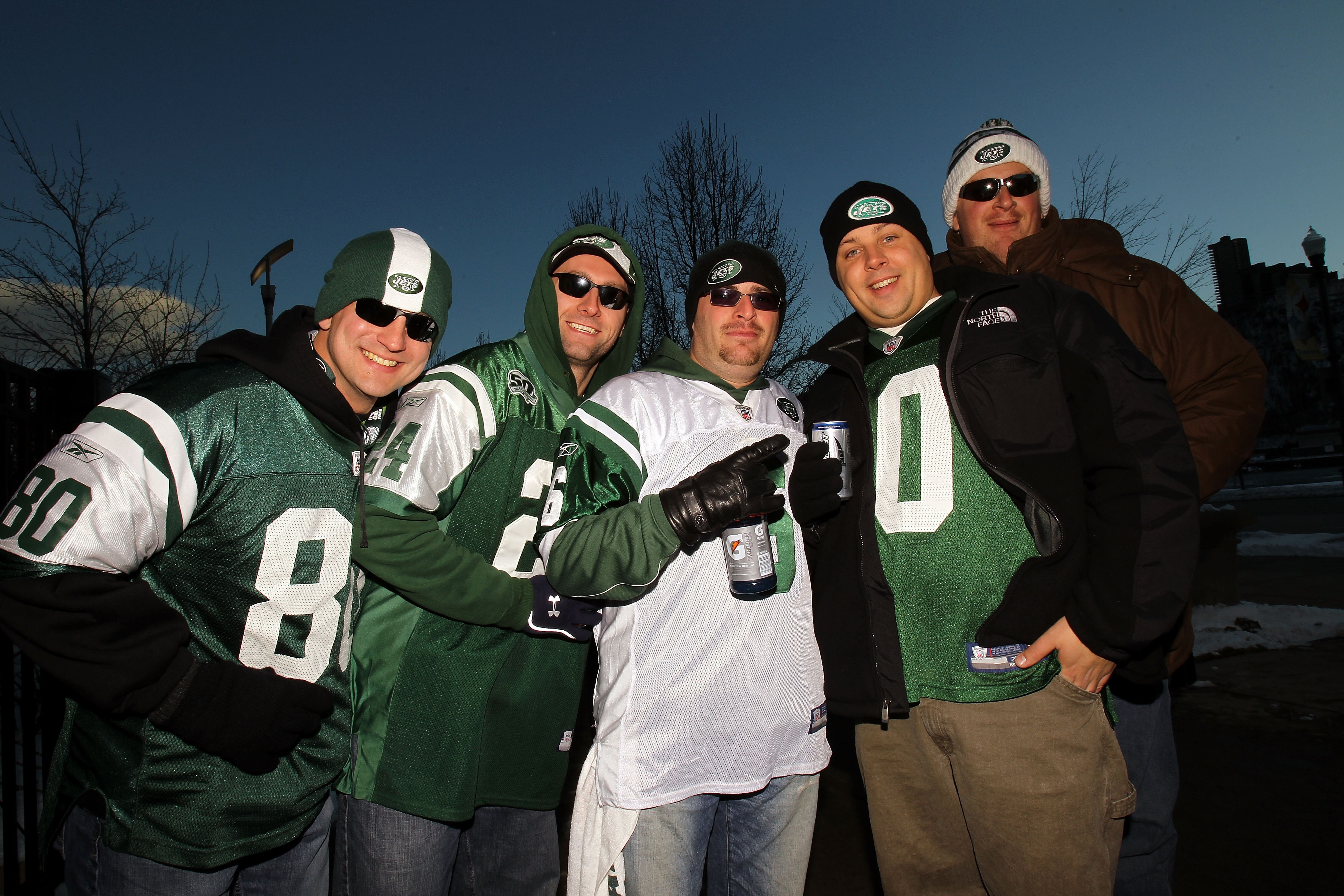 PITTSBURGH, PA - JANUARY 23:  Fans of the New York Jets pose for a photo as they tailgate outside the stadium prior to the 2011 AFC Championship game against the Pittsburgh Steelers at Heinz Field on January 23, 2011 in Pittsburgh, Pennsylvania.  (Photo b