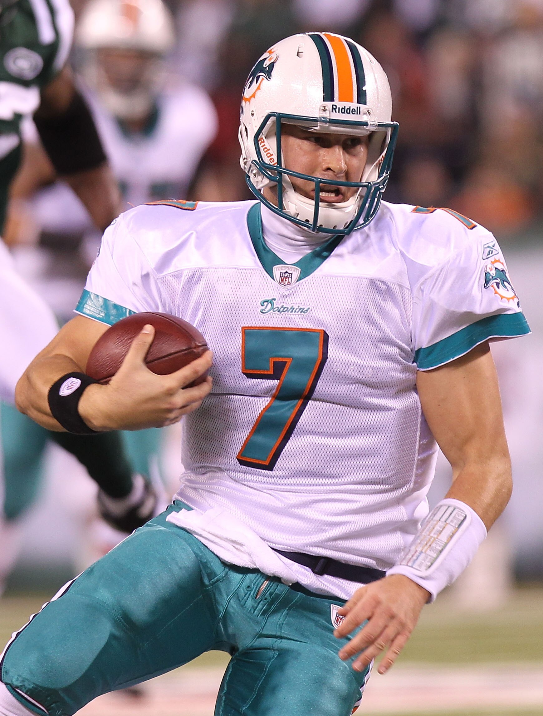 EAST RUTHERFORD, NJ - DECEMBER 12:  Chad Henne #7 of the Miami Dolphins scrambles from the pocket against the New York Jets at New Meadowlands Stadium on December 12, 2010 in East Rutherford, New Jersey.  (Photo by Nick Laham/Getty Images)