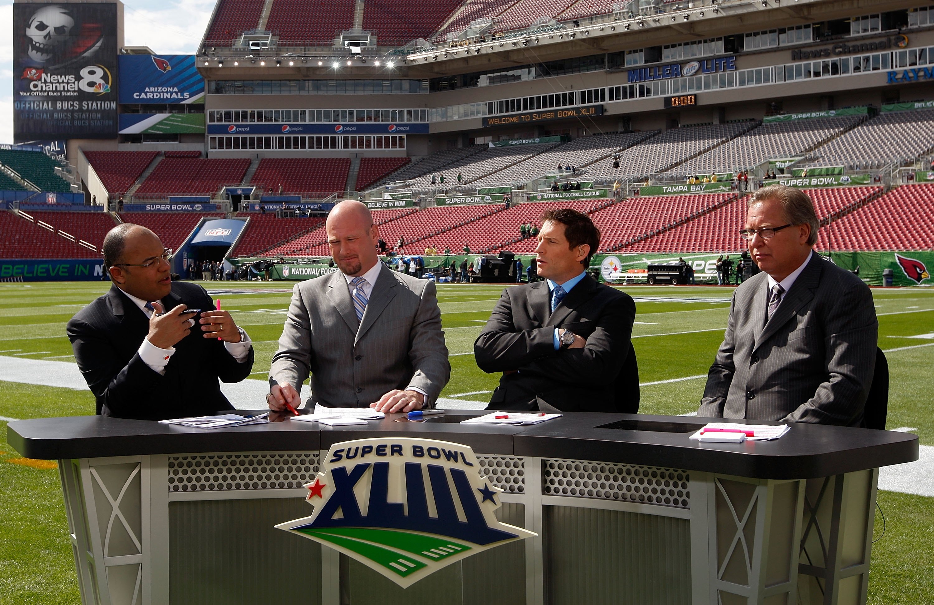 TAMPA, FL - FEBRUARY 01:  (L-R) The ESPN pregame show with host Mike Tirico and analysts Trent Dilfer, Steve Young and Ron Jaworski before Super Bowl XLIII on February 1, 2009 at Raymond James Stadium in Tampa, Florida.  (Photo by Jamie Squire/Getty Image