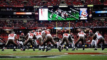ATLANTA - NOVEMBER 29:  The Tampa Bay Buccaneers offense runs a play against the Atlanta Falcons defense at Georgia Dome on November 29, 2009 in Atlanta, Georgia.  (Photo by Kevin C. Cox/Getty Images)