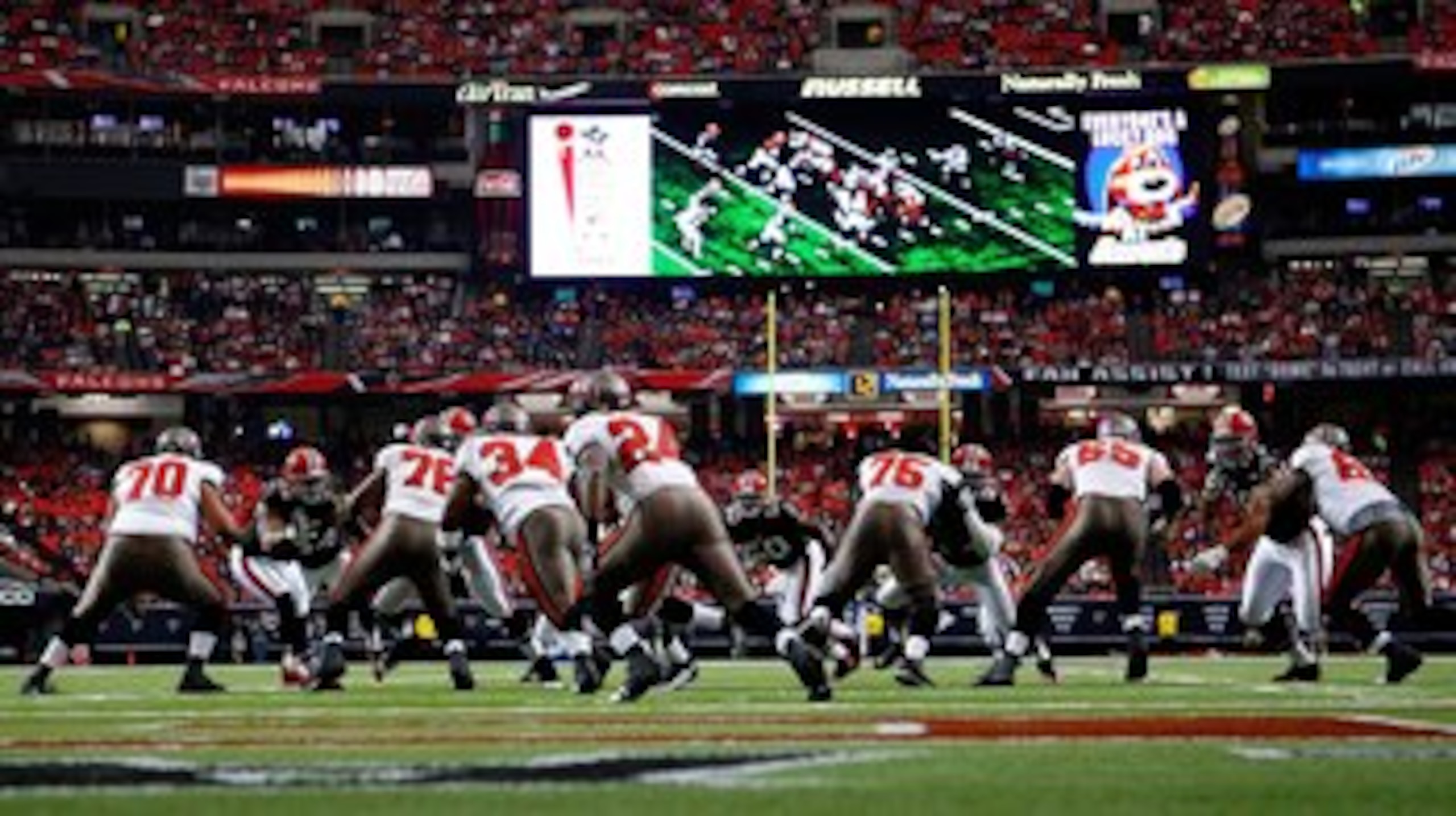 ATLANTA - NOVEMBER 29:  The Tampa Bay Buccaneers offense runs a play against the Atlanta Falcons defense at Georgia Dome on November 29, 2009 in Atlanta, Georgia.  (Photo by Kevin C. Cox/Getty Images)