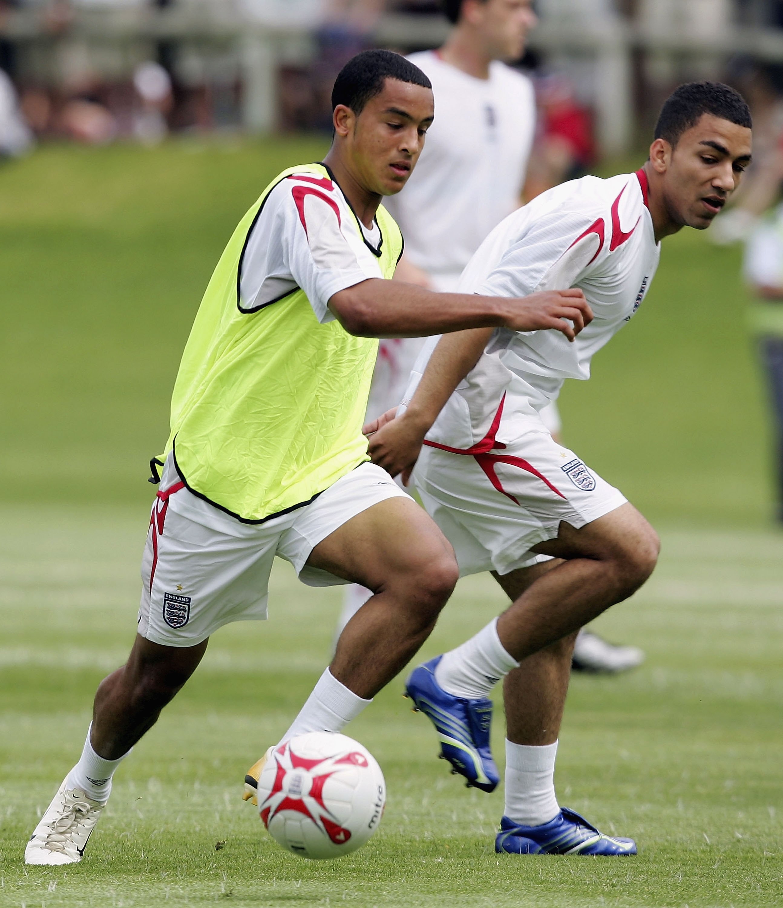 FARO, PORTUGAL - MAY 17:  Theo Walcott and Aaron Lennon of England in action during the squads pre World Cup training camp at Vale do Lobo on May 17, 2006 in Faro, Portugal.  (Photo by Ross Kinnaird/Getty Images)