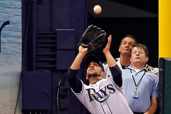 ST. PETERSBURG, FL - APRIL 21: Outfielder Sam Fuld #5 of the Tampa Bay Rays catches a foul ball against the Chicago White Sox during the game at Tropicana Field on April 21, 2011 in St. Petersburg, Florida. (Photo by J. Meric/Getty Images) ST. PETERSBURG, FL - APRIL 21: Outfielder Sam Fuld #5 of the Tampa Bay Rays catches a foul ball against the Chicago White Sox during the game at Tropicana Field on April 21, 2011 in St. Petersburg, Florida. (Photo by J. Meric/Getty Images)