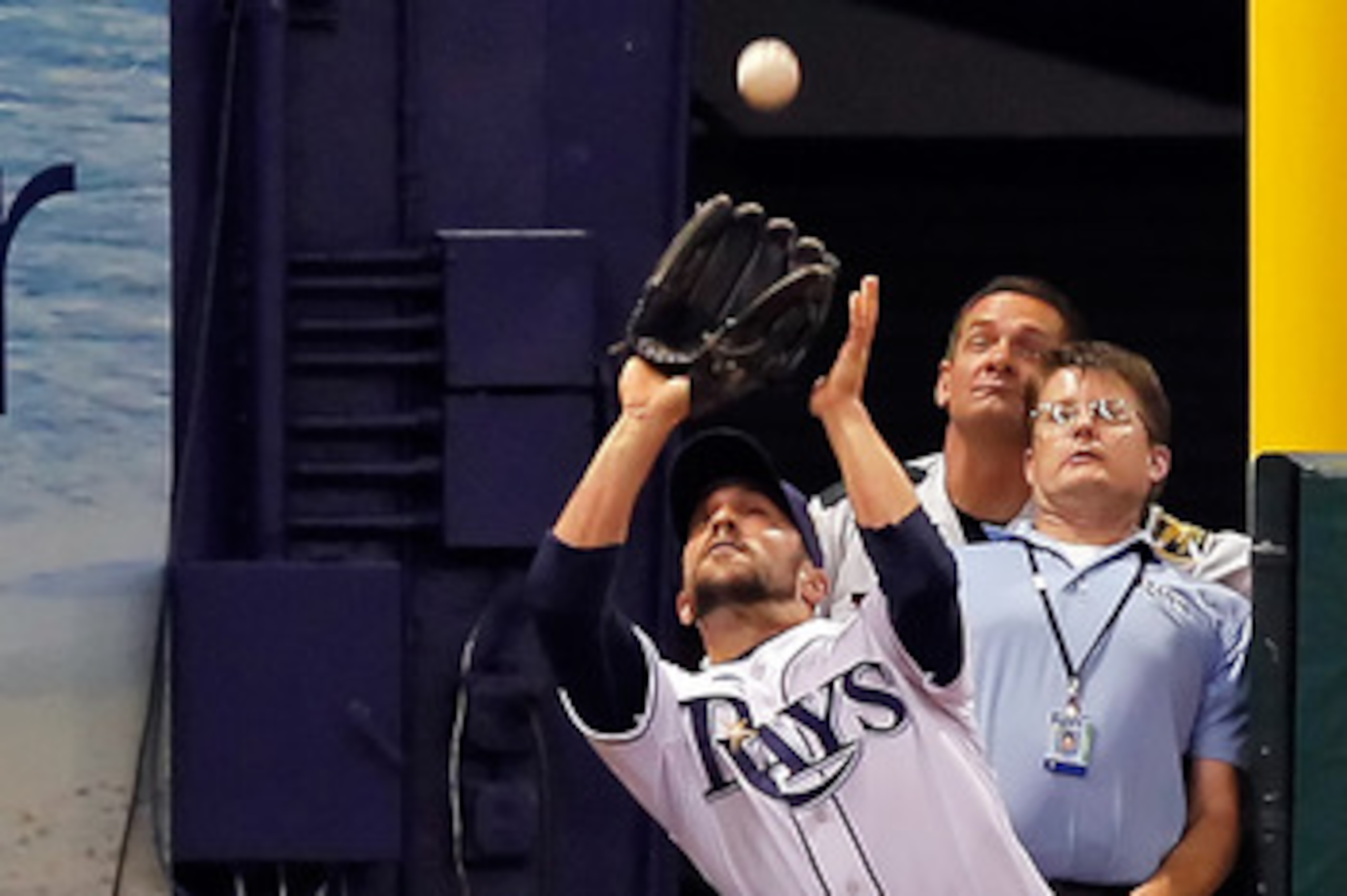 ST. PETERSBURG, FL - APRIL 21:  Outfielder Sam Fuld #5 of the Tampa Bay Rays catches a foul ball against the Chicago White Sox during the game at Tropicana Field on April 21, 2011 in St. Petersburg, Florida.  (Photo by J. Meric/Getty Images)