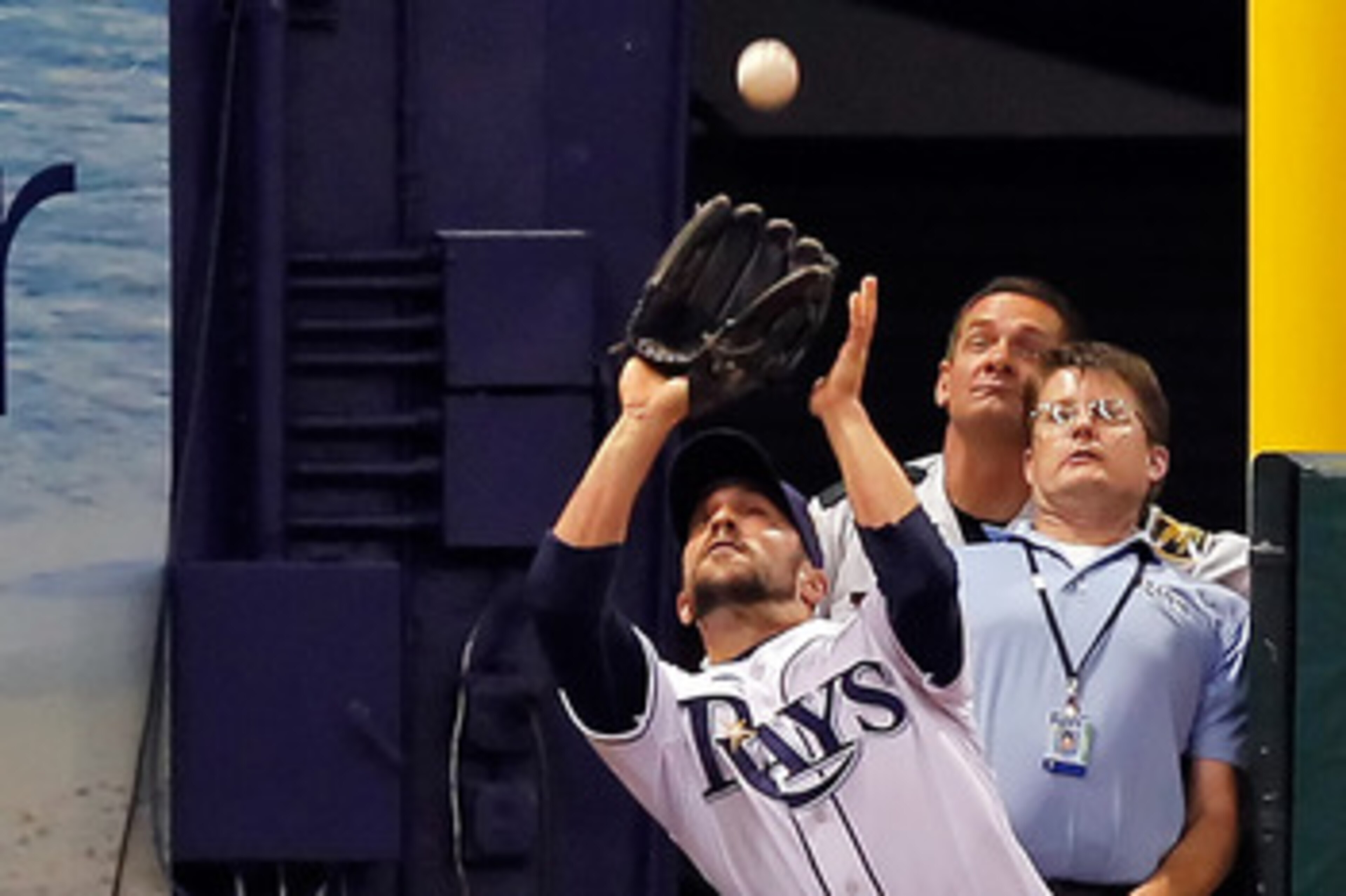 ST. PETERSBURG, FL - APRIL 21:  Outfielder Sam Fuld #5 of the Tampa Bay Rays catches a foul ball against the Chicago White Sox during the game at Tropicana Field on April 21, 2011 in St. Petersburg, Florida.  (Photo by J. Meric/Getty Images)