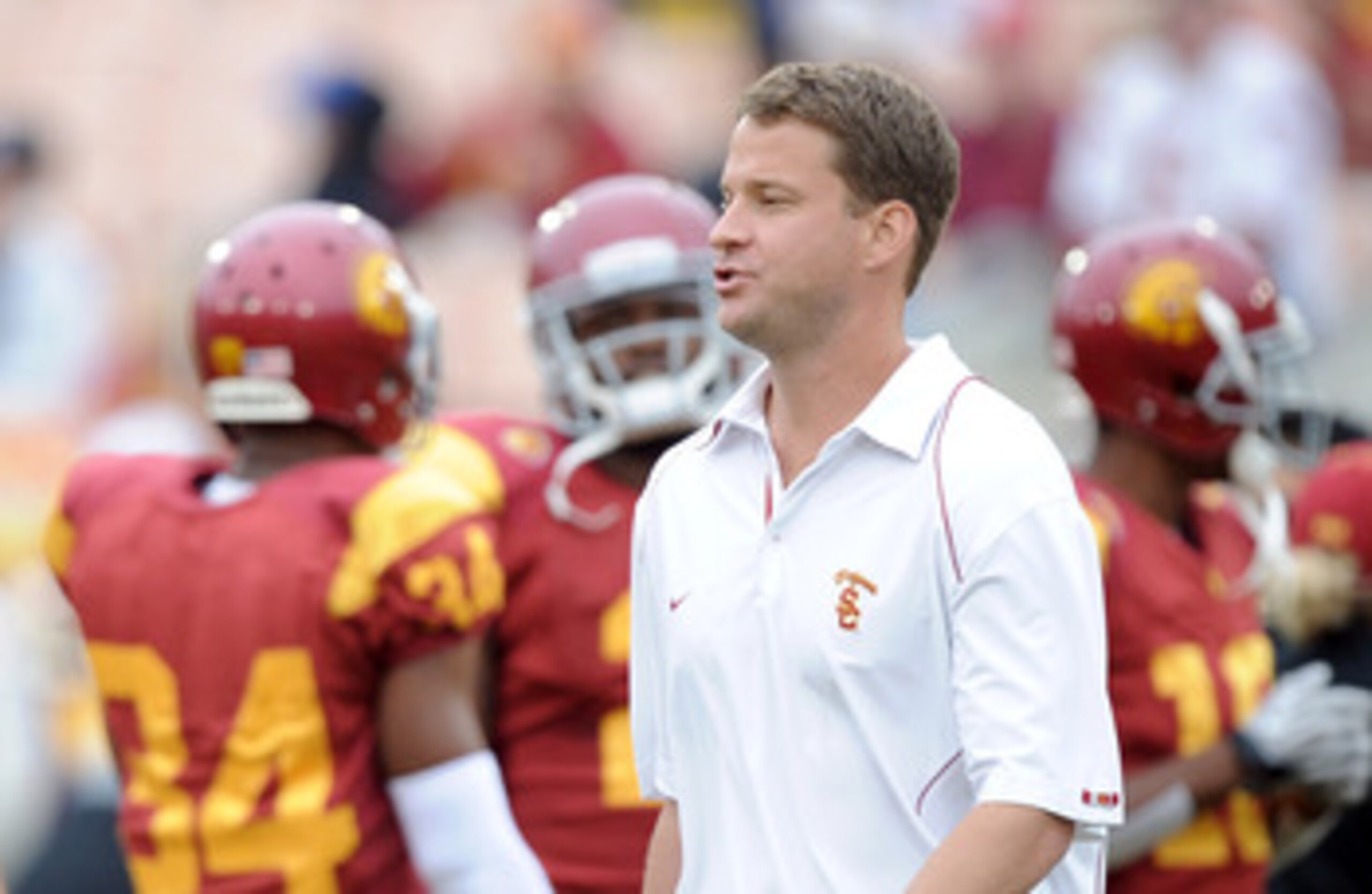 LOS ANGELES, CA - OCTOBER 16:  Head Coach Lane Kiffin of the USC Trojans during warm up against the California Golden Bears at Los Angeles Memorial Coliseum on October 16, 2010 in Los Angeles, California.  (Photo by Harry How/Getty Images)