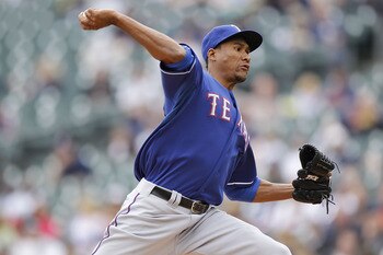 DETROIT, MI - APRIL 11: Alexi Ogando #41 of the Texas Rangers throws a pitch while playing the Detroit Tigers at Comerica Park on April 11, 2011 in Detroit, Michigan. (Photo by Gregory Shamus/Getty Images) DETROIT, MI - APRIL 11: Alexi Ogando #41 of the Texas Rangers throws a pitch while playing the Detroit Tigers at Comerica Park on April 11, 2011 in Detroit, Michigan. (Photo by Gregory Shamus/Getty Images)