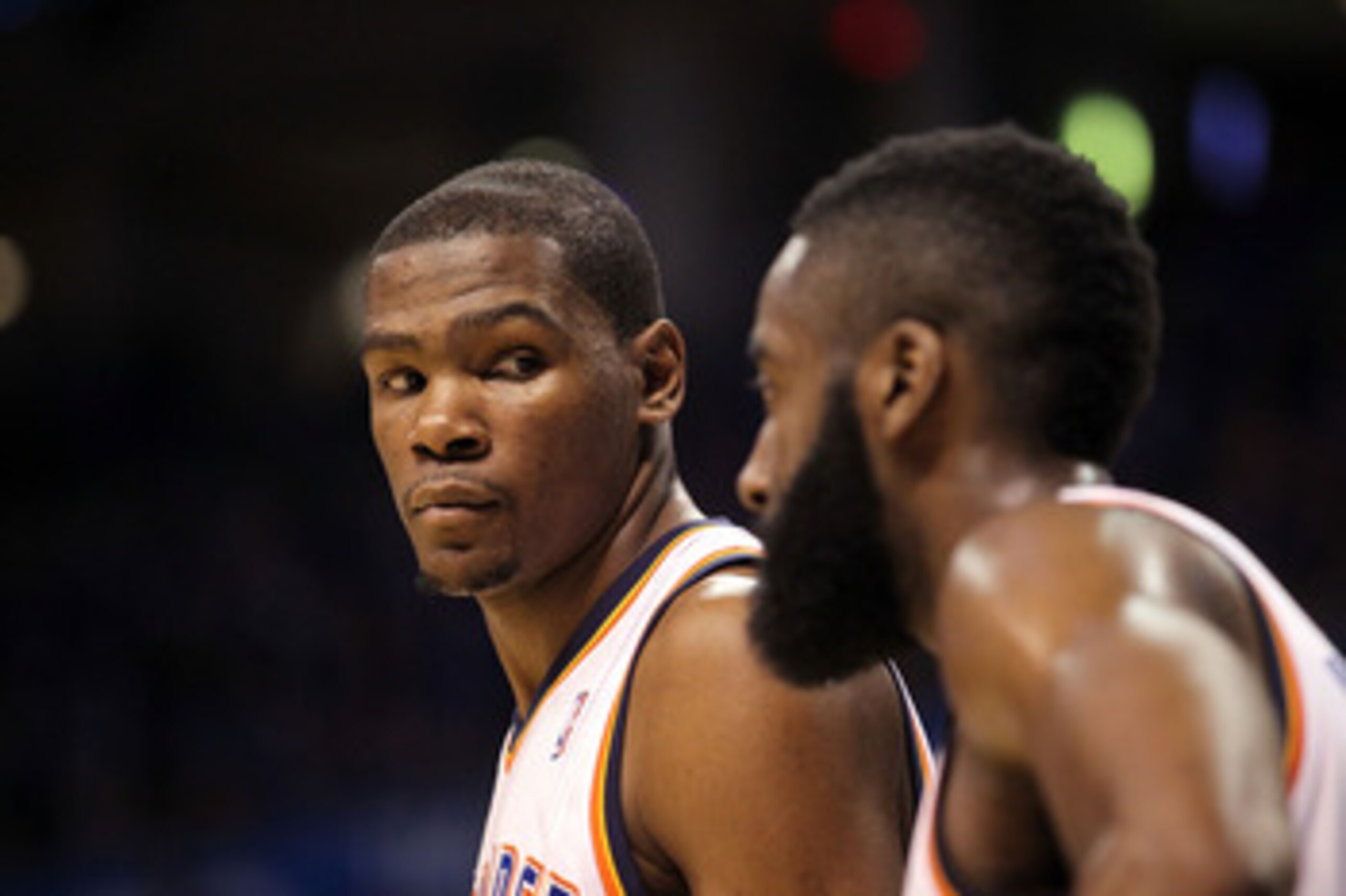 OKLAHOMA CITY, OK - MAY 03:  Forward Kevin Durant #35 of the Oklahoma City Thunder looks at James Harden #13 during play against the Memphis Grizzlies in Game Two of the Western Conference Semifinals in the 2011 NBA Playoffs on May 3, 2011 at Oklahoma Cit