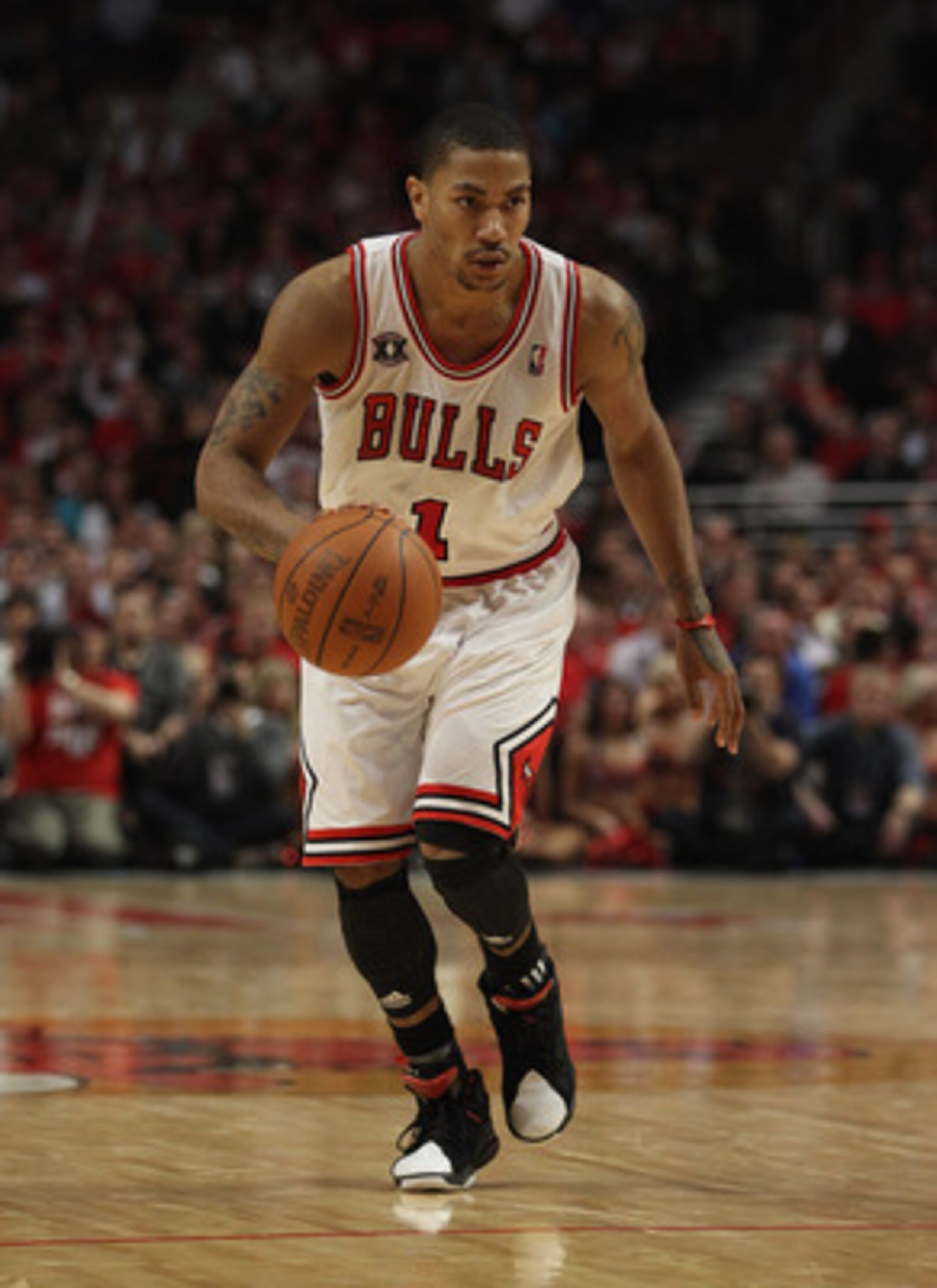 CHICAGO, IL - MAY 04: Derrick Rose #1 of the Chicago Bulls moves with the ball against the Atlanta Hawks in Game Two of the Eastern Conference Semifinals in the 2011 NBA Playoffs at the United Center on May 4, 2011 in Chicago, Illinois. The Bulls defeated