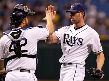 ST. PETERSBURG, FL - APRIL 15: Pitcher Kyle Farnsworth #43 of the Tampa Bay Rays celebrates the last out with catcher Kelly Shoppach #10 during a game against the Minnesota Twins at Tropicana Field on April 15, 2011 in St. Petersburg, Florida. (Photo by ST. PETERSBURG, FL - APRIL 15: Pitcher Kyle Farnsworth #43 of the Tampa Bay Rays celebrates the last out with catcher Kelly Shoppach #10 during a game against the Minnesota Twins at Tropicana Field on April 15, 2011 in St. Petersburg, Florida. (Photo by