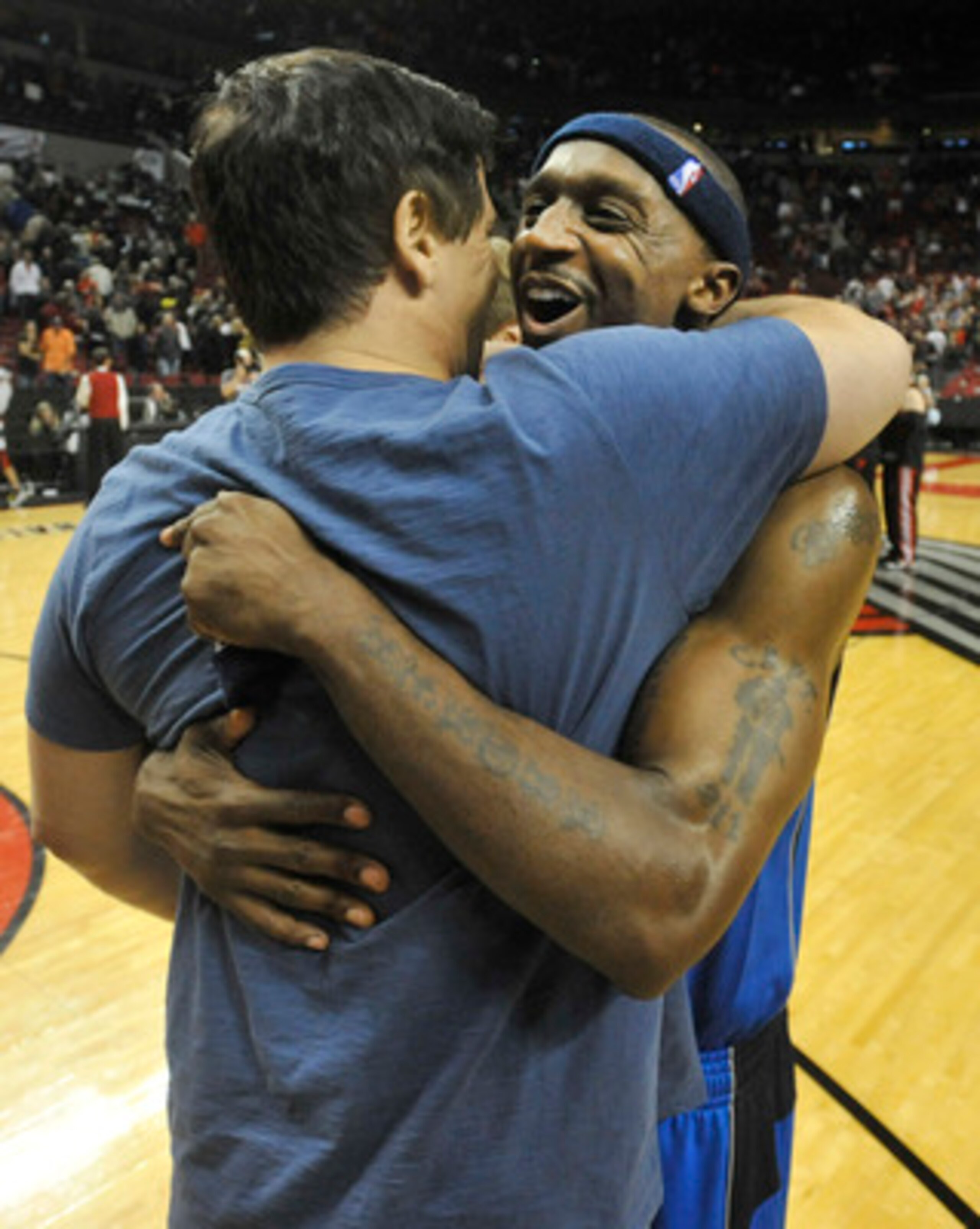 PORTLAND, OR - APRIL 28: Owner Mark Cuban of the Dallas Mavericks hugs Jason Terry #31 of the Dallas Mavericks after Game Six of the Western Conference Quartefinals against the Portland Trail Blazers in the 2011 NBA Playsoffs on April 28, 2011 at the Rose