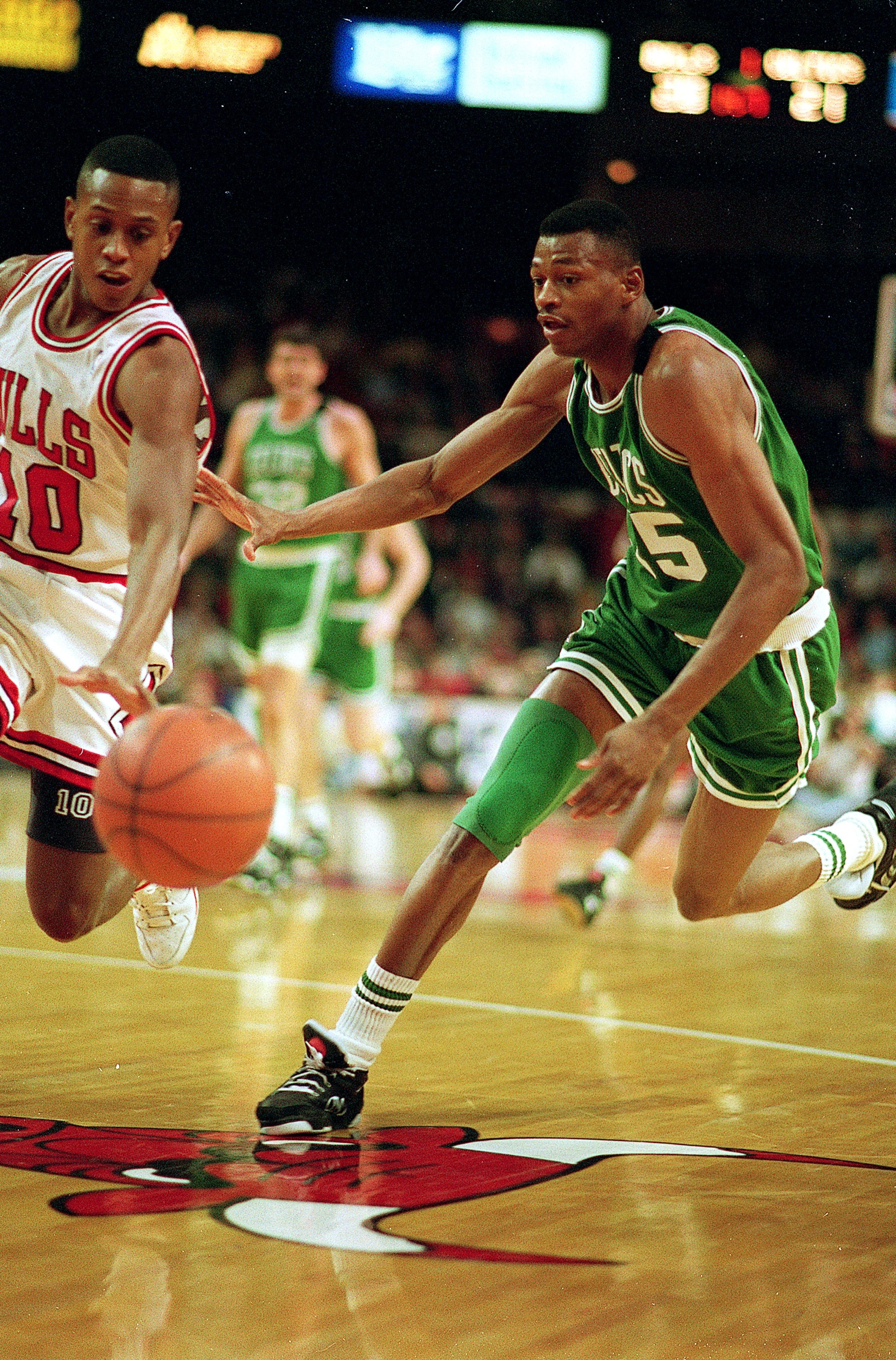 CHICAGO - 1993:  Reggie Lewis of the Boston Celtics dribbles the ball during the 1993 NBA game against the Chicago Bulls at the United Center in Chicago, Illinois. NOTE TO USER: User expressly acknowledges and agrees that, by downloading and/or using this