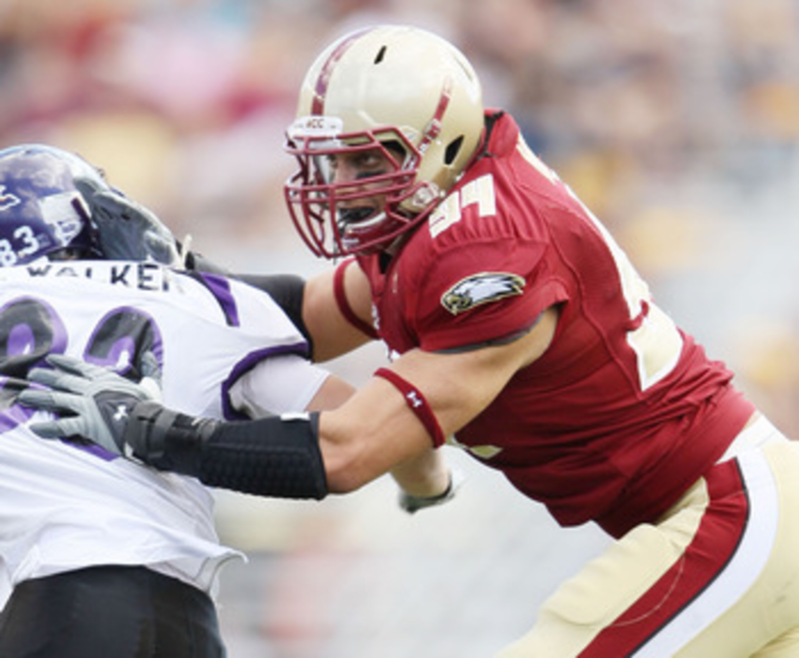 CHESTNUT HILL, MA - SEPTEMBER 04:  Mark Herzlich #94 of the Boston College Eagles blocks Erik Walker #83 of the Weber State Wildcats on September 4, 2010 at Alumni Stadium in Chestnut Hill, Massachusetts. Boston College defeated Weber State 38-20.  (Photo