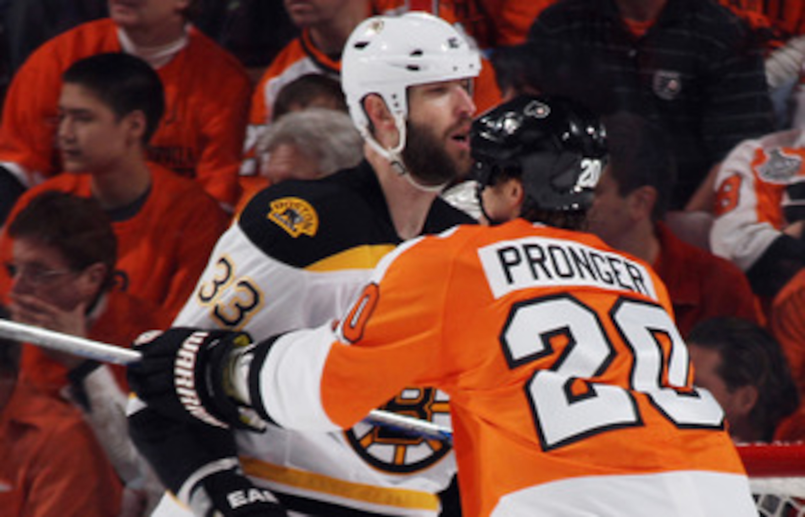PHILADELPHIA, PA - APRIL 30: Chris Pronger #20 of the Philadelphia Flyers and Zdeno Chara #33 of the Boston Bruins battle in Game One of the Eastern Conference Semifinals during the 2011 NHL Stanley Cup Playoffs at the Wells Fargo Center on April 30, 2011