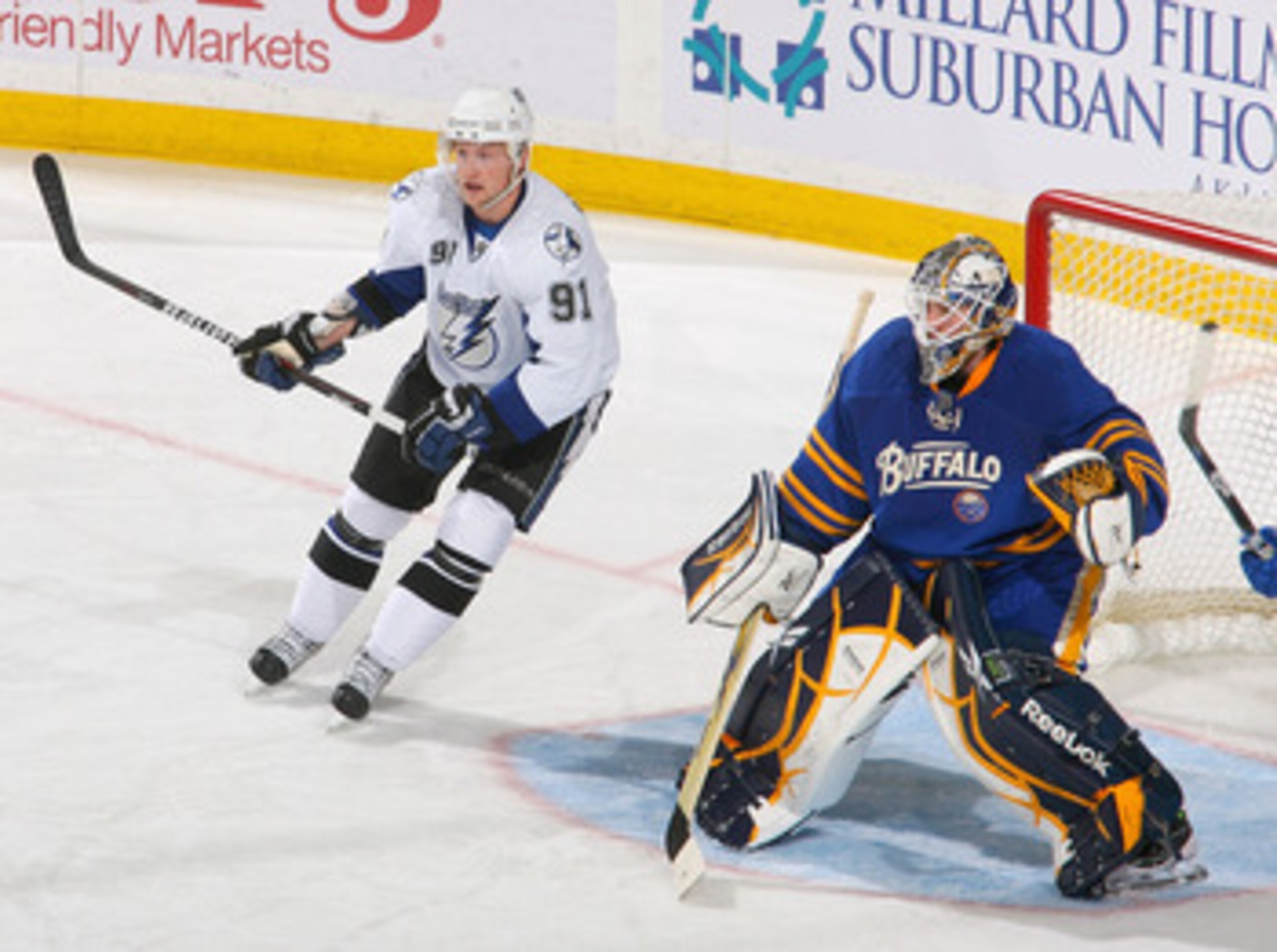 BUFFALO, NY - APRIL 05: Steven Stamkos #91 of the Tampa Bay Lightning skates in on Jhonas Enroth #1 of the Buffalo Sabres  at HSBC Arena on April 5, 2011 in Buffalo, New York.  (Photo by Rick Stewart/Getty Images)