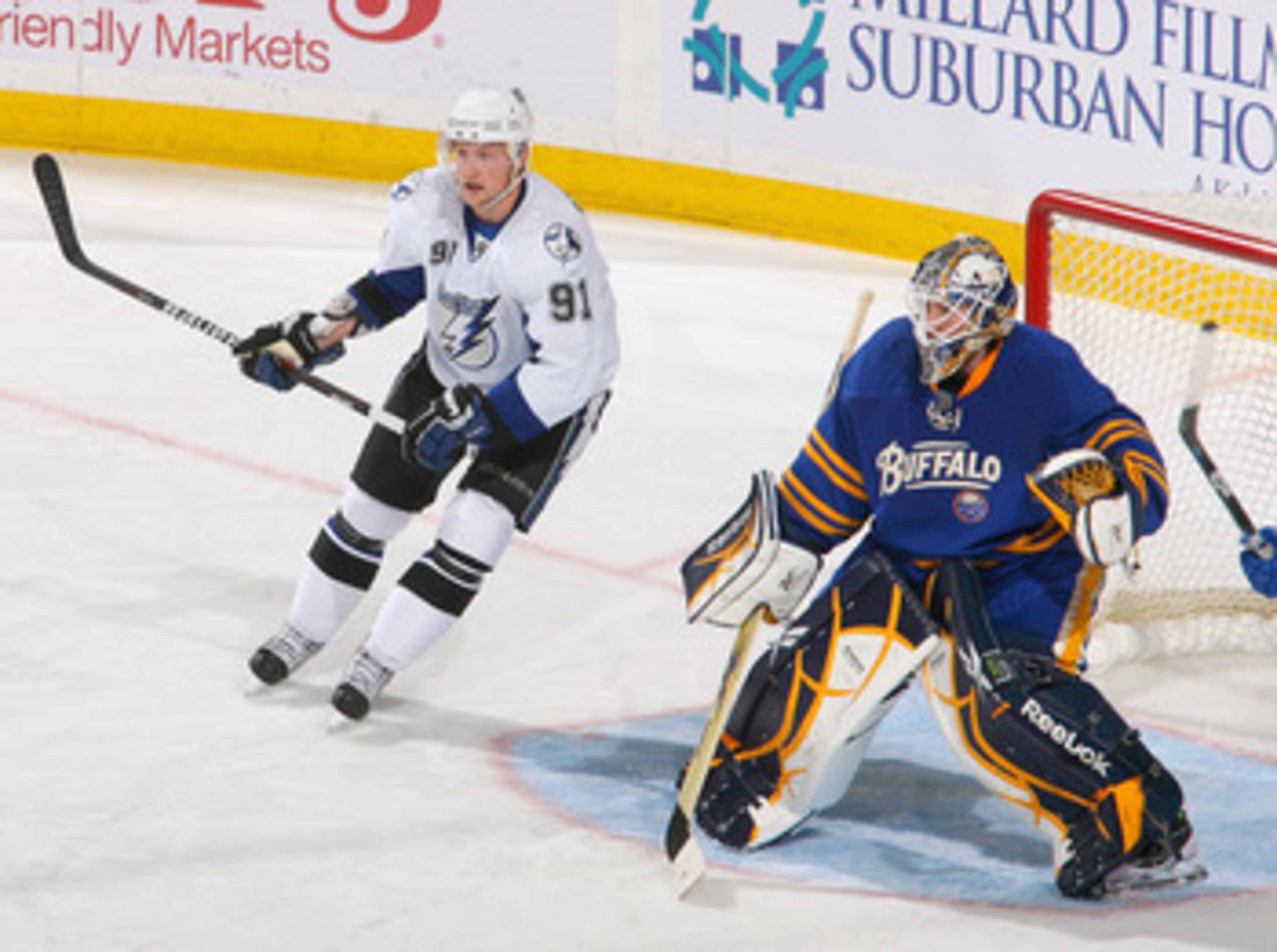 BUFFALO, NY - APRIL 05: Steven Stamkos #91 of the Tampa Bay Lightning skates in on Jhonas Enroth #1 of the Buffalo Sabres  at HSBC Arena on April 5, 2011 in Buffalo, New York.  (Photo by Rick Stewart/Getty Images)