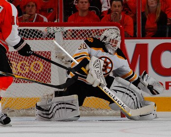 PHILADELPHIA, PA - MAY 02: Goalie Tim Thomas #30 of the Boston Bruins makes a save against the Philadelphia Flyers during the third period of Game Two of the Eastern Conference Semifinals during the 2011 NHL Stanley Cup Playoffs at Wells Fargo Center on M