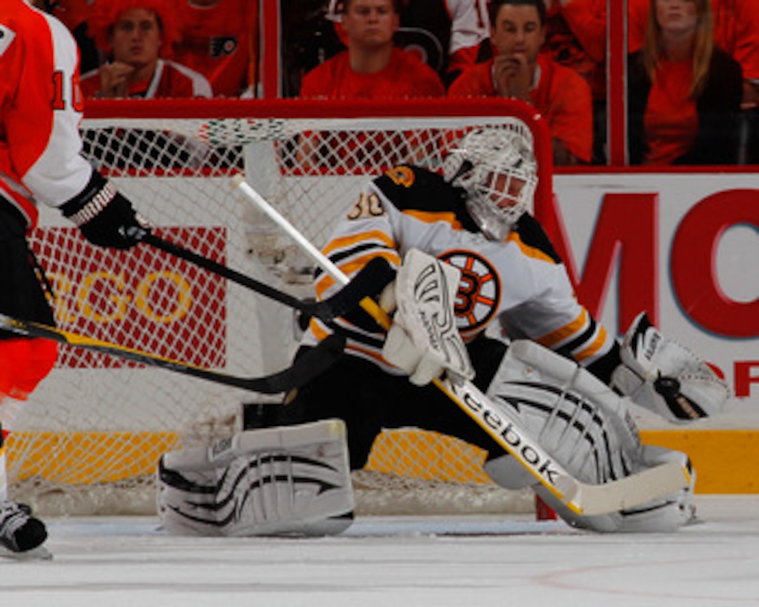 PHILADELPHIA, PA - MAY 02: Goalie Tim Thomas #30 of the Boston Bruins makes a save against the Philadelphia Flyers during the third period of Game Two of the Eastern Conference Semifinals during the 2011 NHL Stanley Cup Playoffs at Wells Fargo Center on M