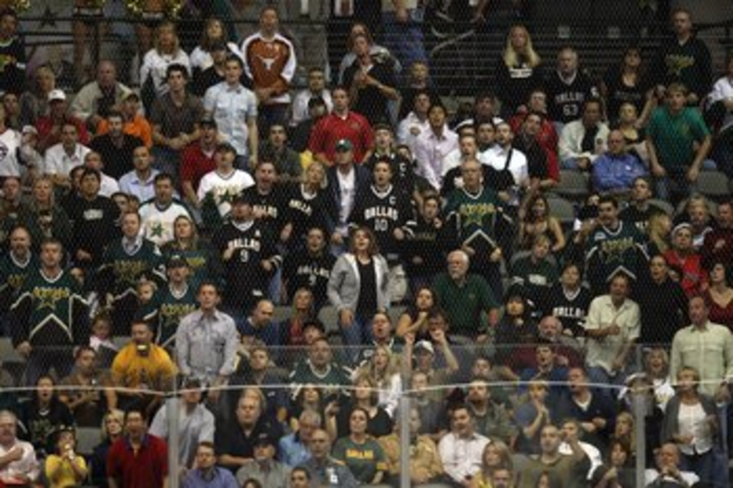 DALLAS - OCTOBER 10: NHL fans cheer during play between the Columbus Blue Jackets and the Dallas Stars at the American Airlines Center on October 10, 2008 in Dallas, Texas. (Photo by Ronald Martinez/Getty Images) DALLAS - OCTOBER 10: NHL fans cheer during play between the Columbus Blue Jackets and the Dallas Stars at the American Airlines Center on October 10, 2008 in Dallas, Texas. (Photo by Ronald Martinez/Getty Images)