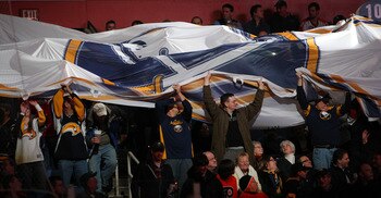BUFFALO NY - JANUARY 11:  Prior to the start of the Buffalo Sabres match against the Philadelphia Flyers fans pass around a giant Sabres flag during their NHL game at HSBC Arena January 11, 2011 in Buffalo, New York. (Photo By Dave Sandford/Getty Images)