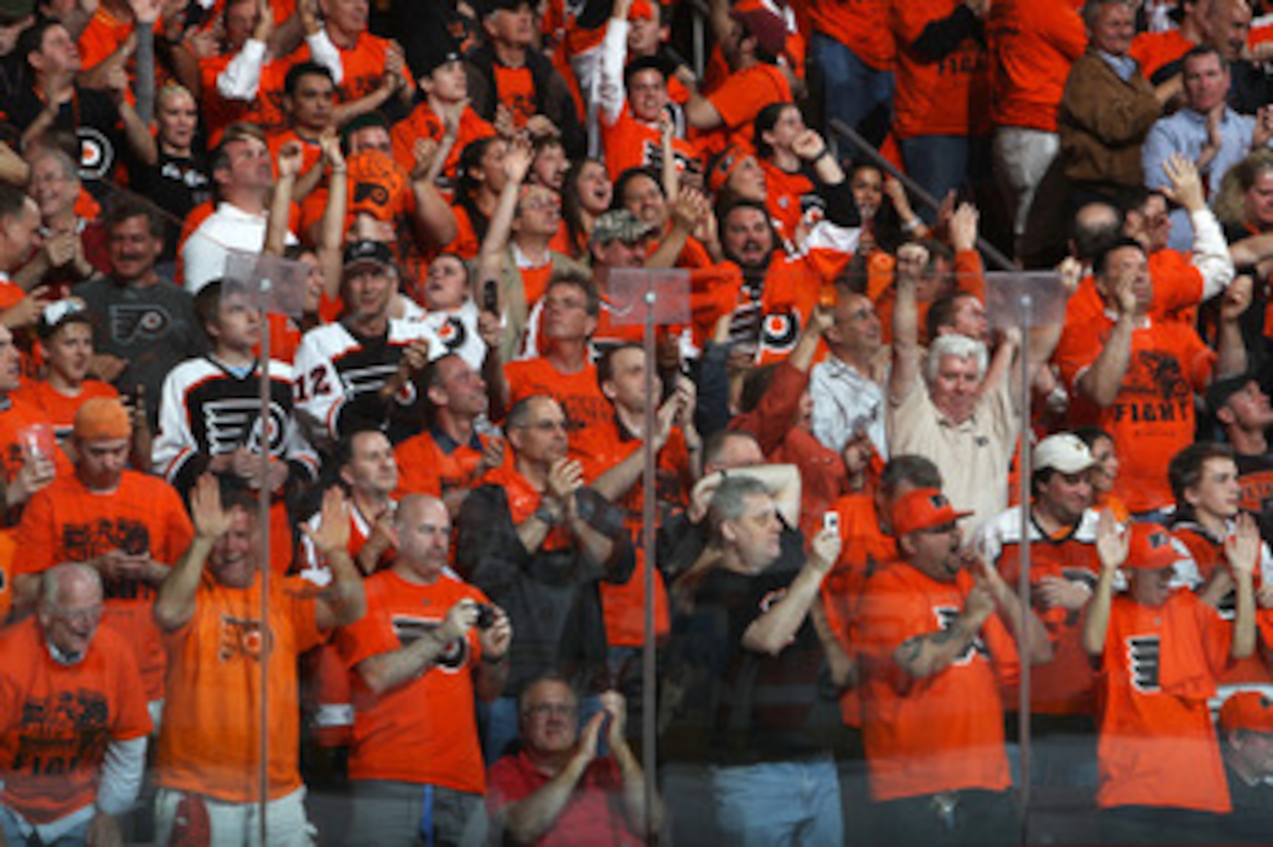 PHILADELPHIA, PA - APRIL 26: Philadelphia Flyers fans celebrate during the second period of their game against the Buffalo Sabres in Game Seven of the Eastern Conference Quarterfinals during the 2011 NHL Stanley Cup Playoffs at Wells Fargo Center on Apri PHILADELPHIA, PA - APRIL 26: Philadelphia Flyers fans celebrate during the second period of their game against the Buffalo Sabres in Game Seven of the Eastern Conference Quarterfinals during the 2011 NHL Stanley Cup Playoffs at Wells Fargo Center on Apri