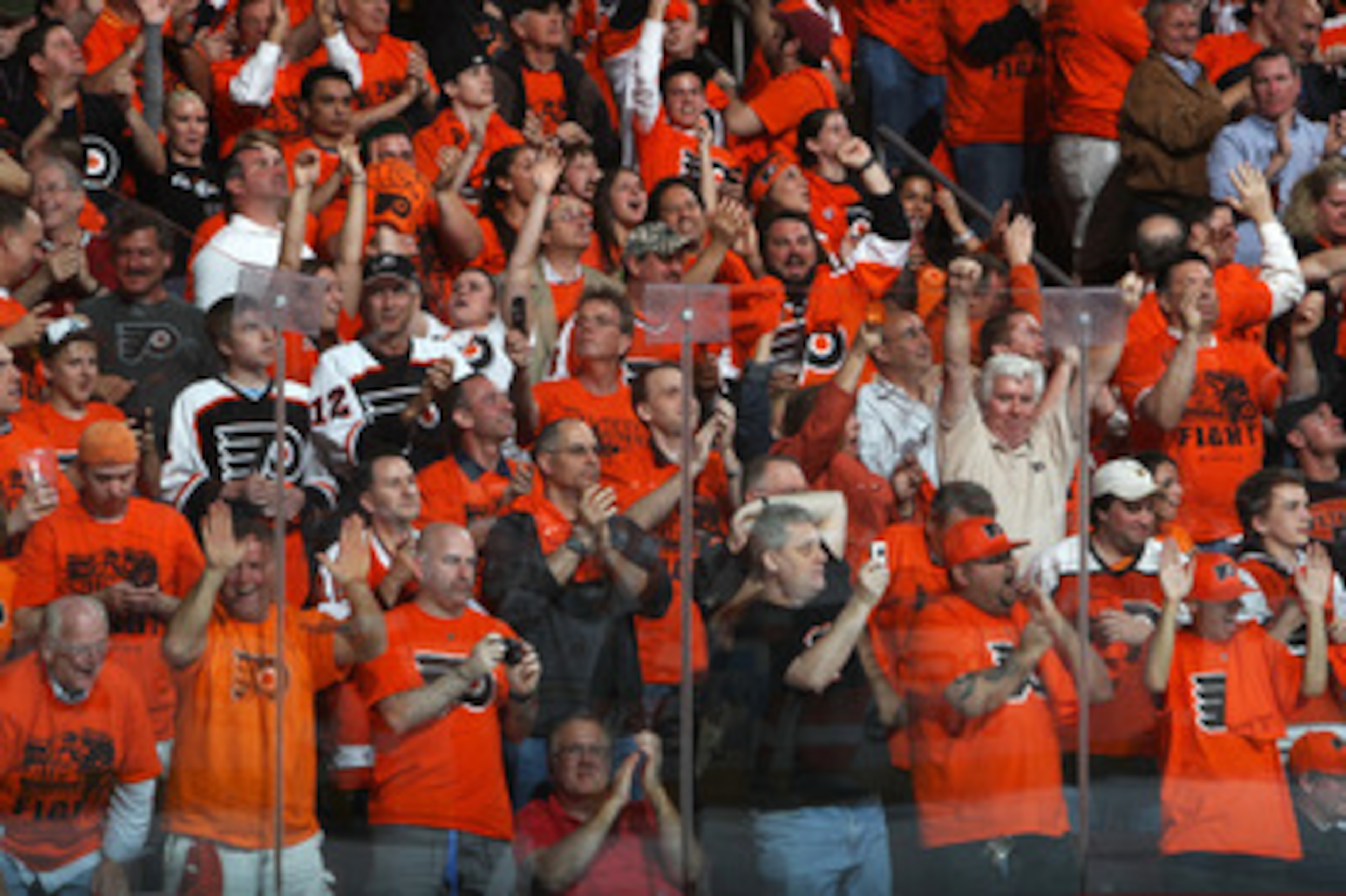 PHILADELPHIA, PA - APRIL 26:  Philadelphia Flyers fans celebrate during the second period of their game against the Buffalo Sabres in Game Seven of the Eastern Conference Quarterfinals during the 2011 NHL Stanley Cup Playoffs at Wells Fargo Center on Apri