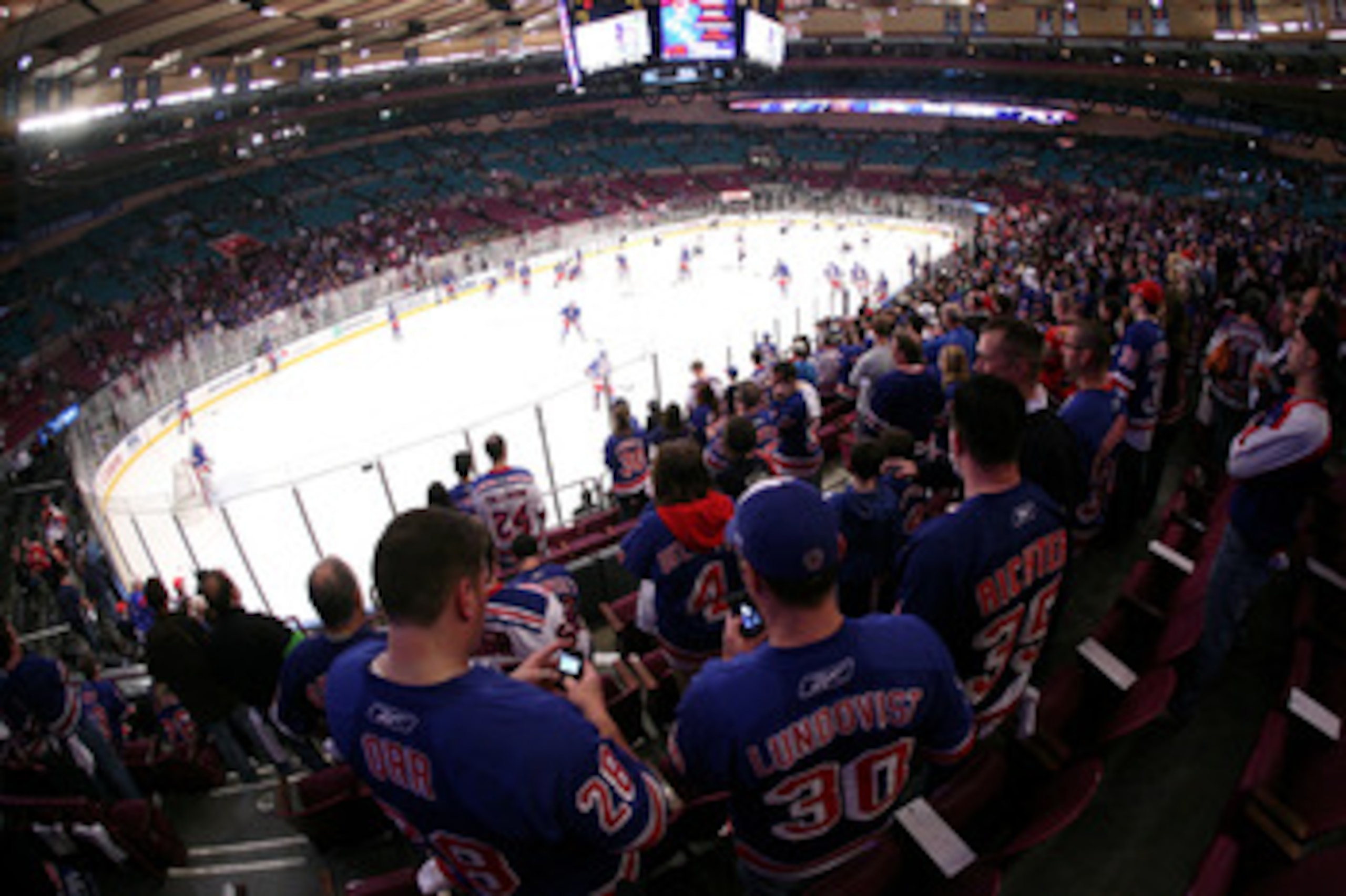 NEW YORK, NY - APRIL 20: Fans watch the New York Rangers warm up against the Washington Capitals in Game Four of the Eastern Conference Quarterfinals during the 2011 NHL Stanley Cup Playoffs at Madison Square Garden on April 20, 2011 in New York City. ( NEW YORK, NY - APRIL 20: Fans watch the New York Rangers warm up against the Washington Capitals in Game Four of the Eastern Conference Quarterfinals during the 2011 NHL Stanley Cup Playoffs at Madison Square Garden on April 20, 2011 in New York City. (