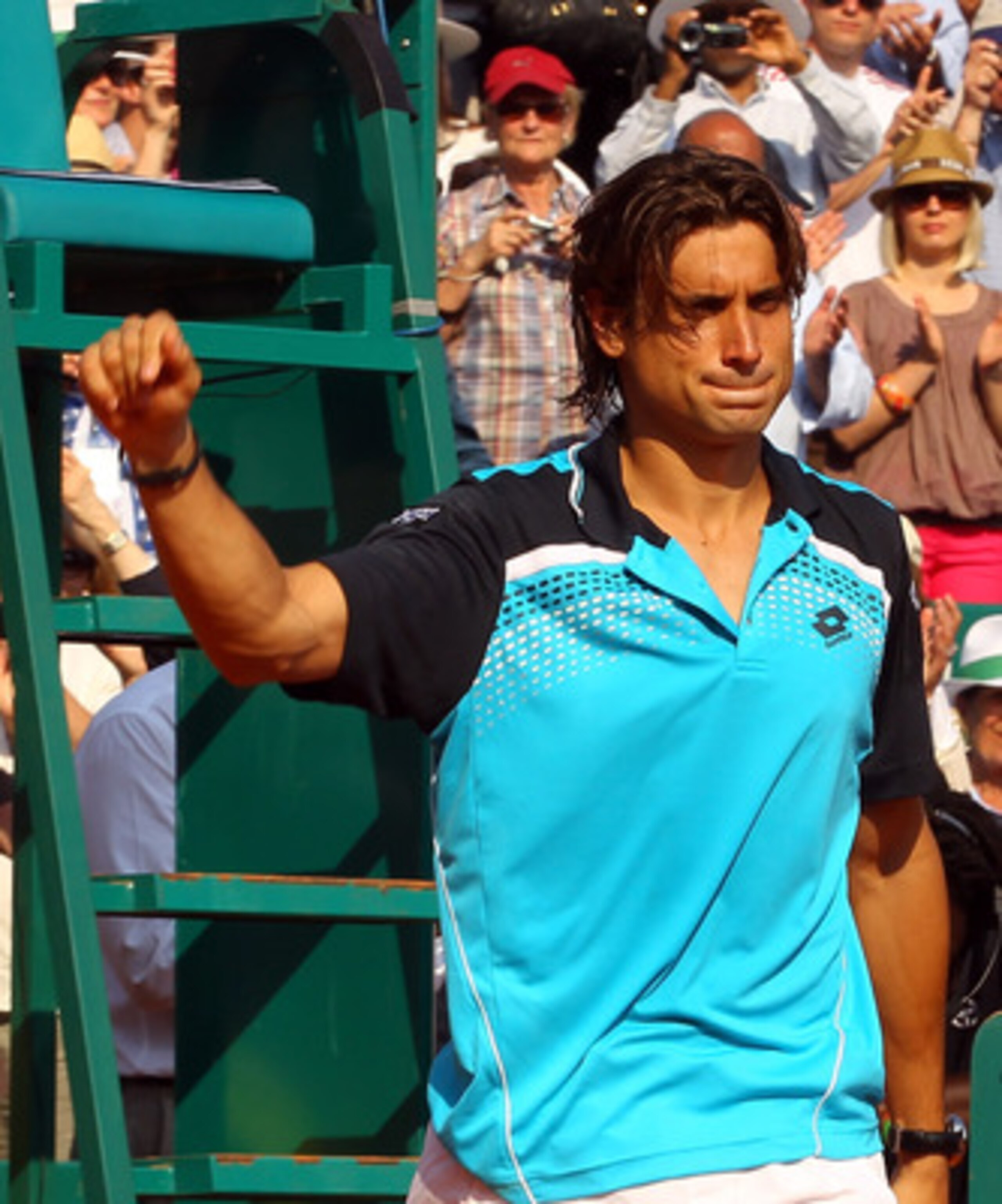 MONACO - APRIL 17:  David Ferrer of Spain thanks the support after losing to Rafael Nadal of Spain in the final during Day Eight of the ATP Masters Series Tennis at the Monte Carlo Country Club on April 17, 2011 in Monte Carlo, Monaco.  (Photo by Julian F