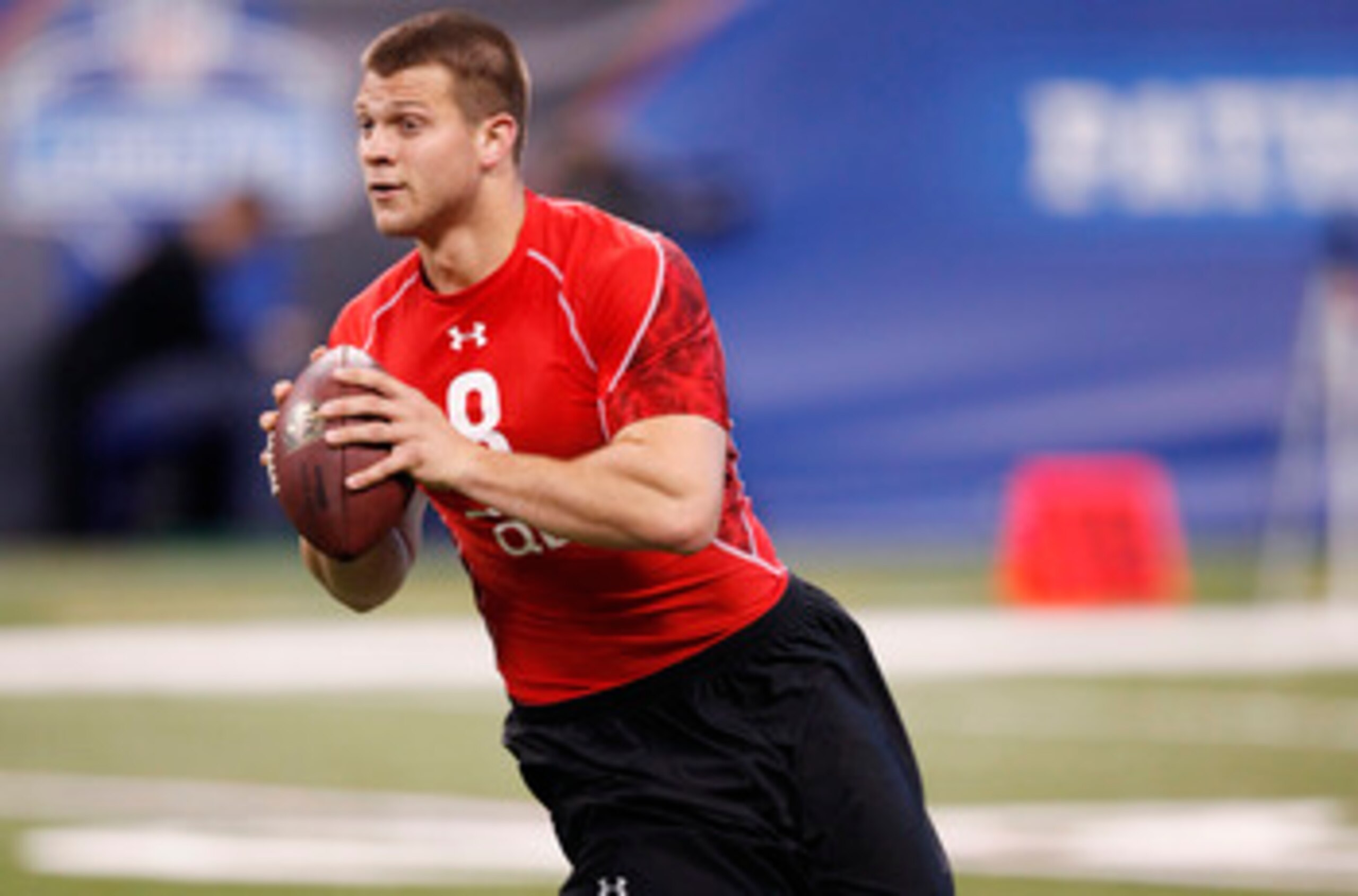 INDIANAPOLIS, IN - FEBRUARY 27:  Quarterback Jake Locker of Washington runs a passing drill during the 2011 NFL Scouting Combine at Lucas Oil Stadium on February 27, 2011 in Indianapolis, Indiana. (Photo by Joe Robbins/Getty Images)