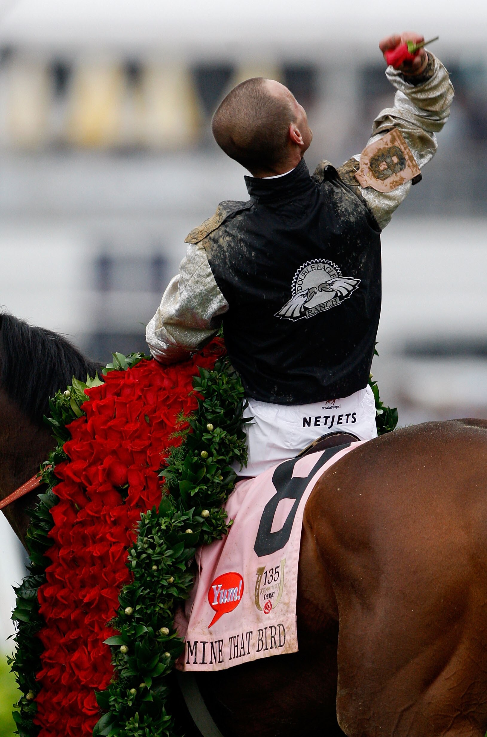 LOUISVILLE, KY - MAY 02:  Jockey Calvin Borel atop Mine That Bird celebrates his win in the 135th running of the Kentucky Derby by tossing a rose on May 2, 2009 at Churchill Downs in Louisville, Kentucky.  (Photo by Jamie Squire/Getty Images)