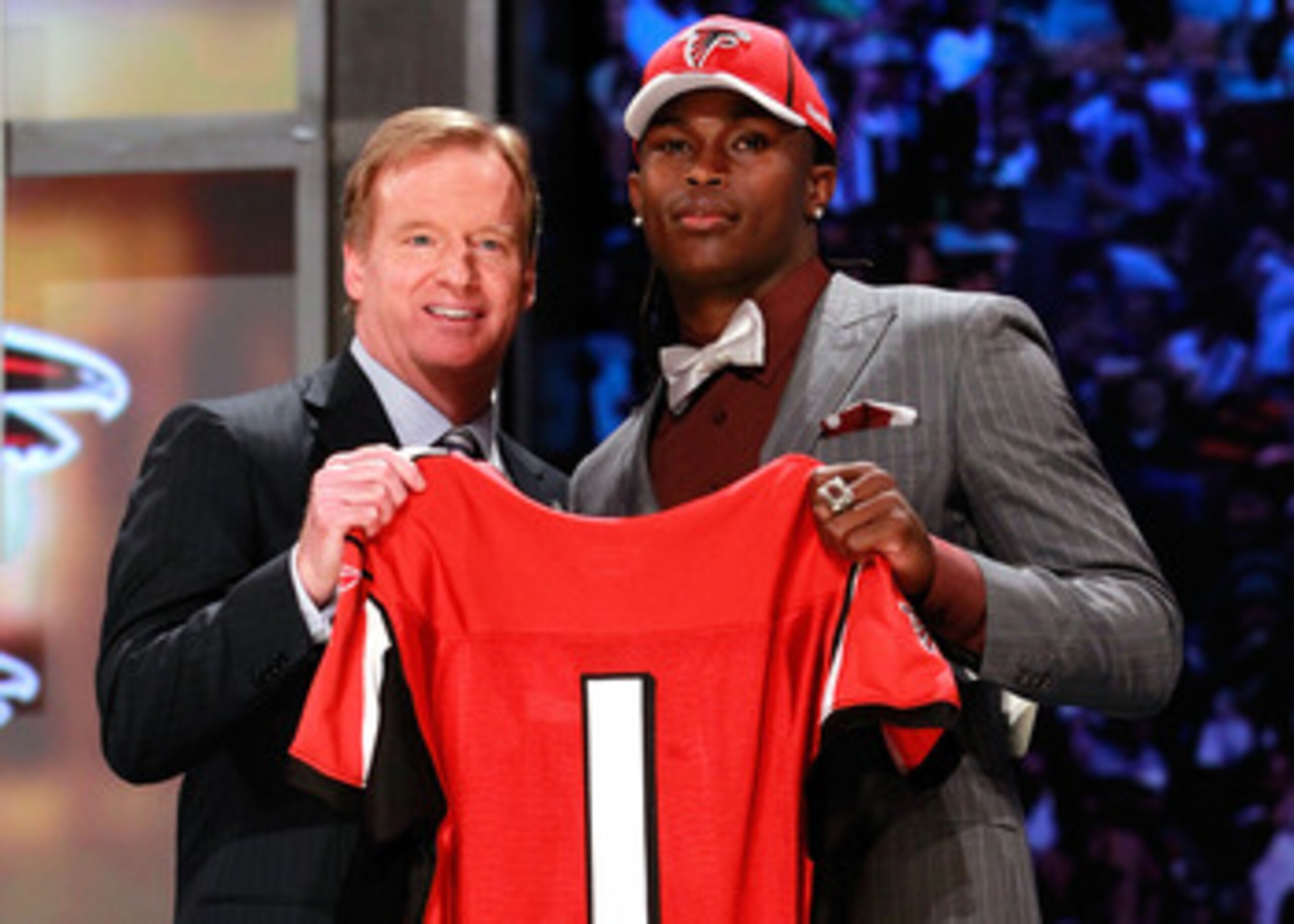 NEW YORK, NY - APRIL 28:  NFL Commissioner Roger Goodell (L) poses for a photo with Julio Jones, #6 overall pick by the Atlanta Falcons, holds up a jersey on stage during the 2011 NFL Draft at Radio City Music Hall on April 28, 2011 in New York City.  (Ph