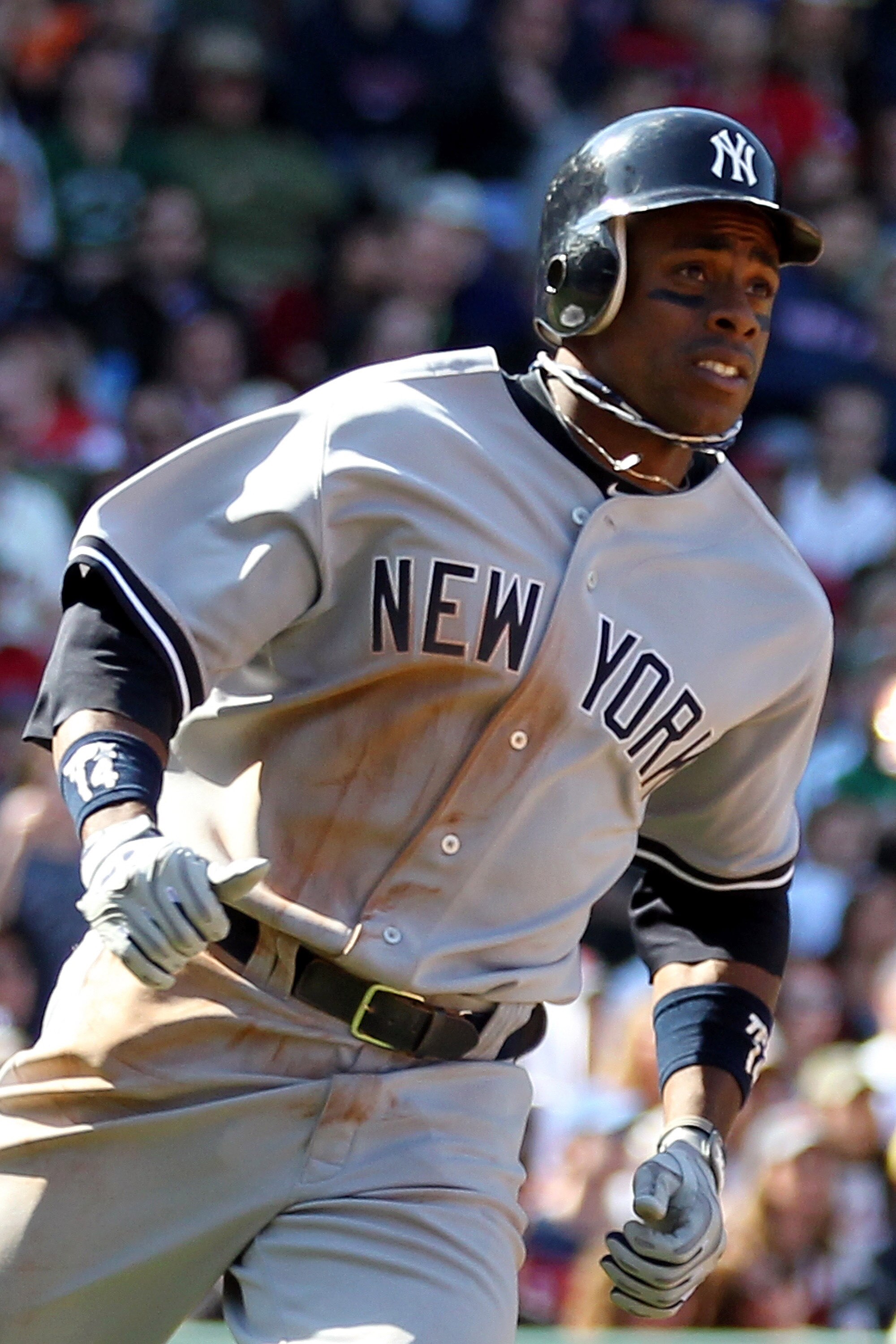 BOSTON, MA - APRIL 9:  Curtis Granderson #14 of the New York Yankees rounds the bases after hitting a home run off of Felix Doubront #61 of the Boston Red Sox at Fenway Park April 9, 2011 in Boston, Massachusetts. (Photo by Jim Rogash/Getty Images)