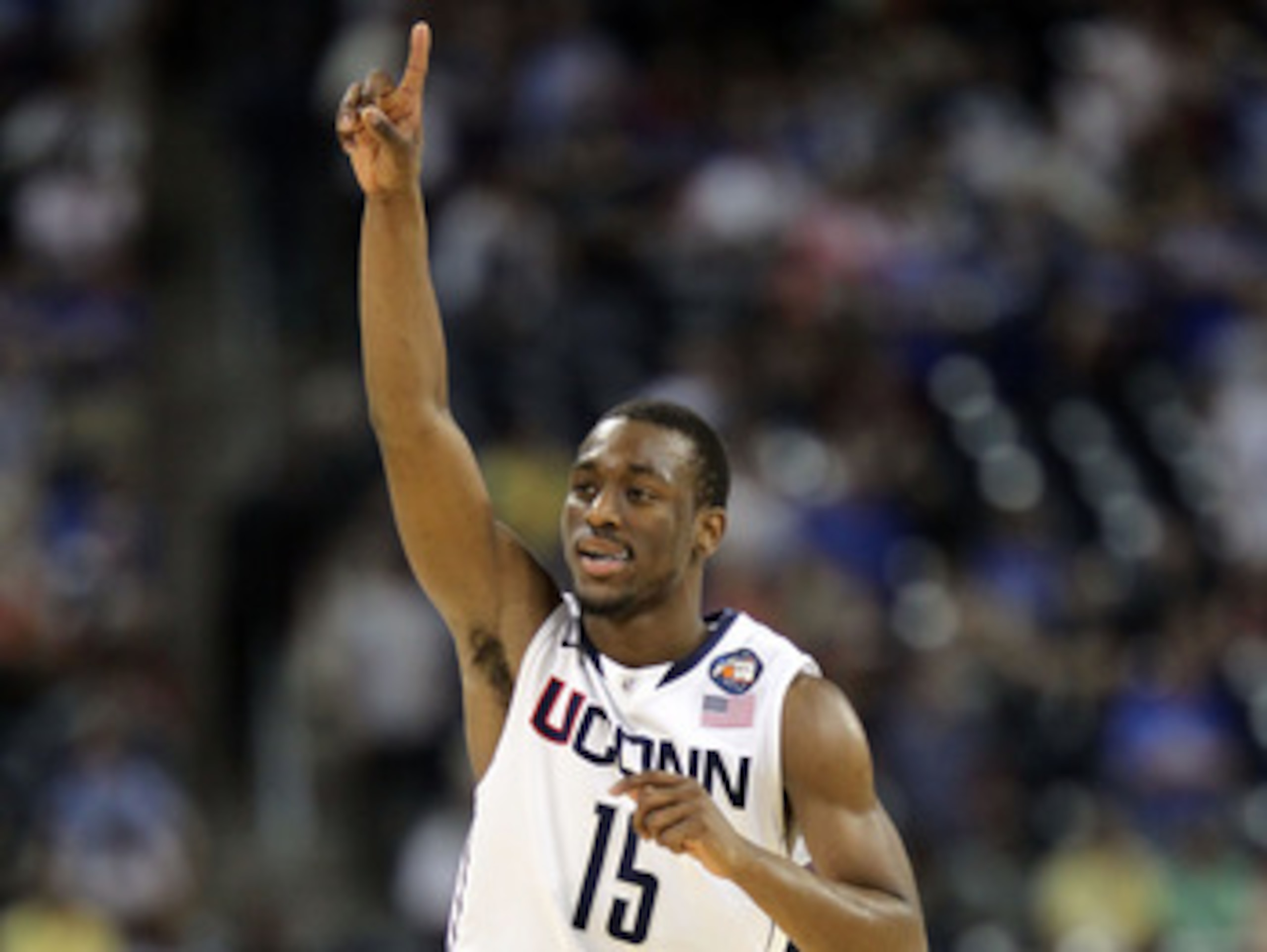 HOUSTON, TX - APRIL 02:  Kemba Walker #15 of the Connecticut Huskies reacts towards the end of the game against the Kentucky Wildcats during the National Semifinal game of the 2011 NCAA Division I Men's Basketball Championship at Reliant Stadium on April