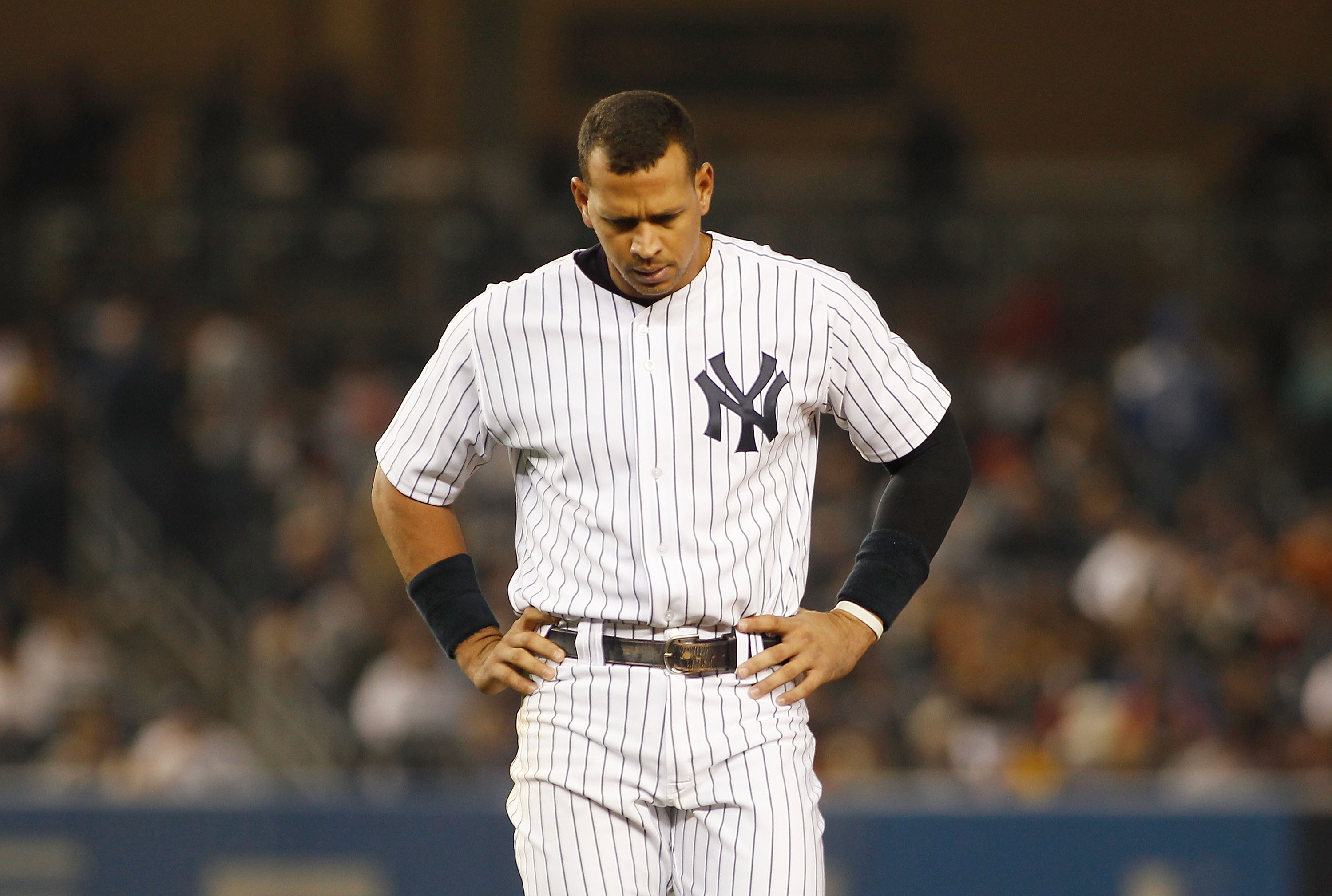 NEW YORK - MAY 20:  Alex Rodriguez #13 of the New York Yankees reacts after grounding out with the bases loaded against the New York Mets on May 20, 2011 at Yankee Stadium in the Bronx borough of New York City.  (Photo by Mike Stobe/Getty Images)