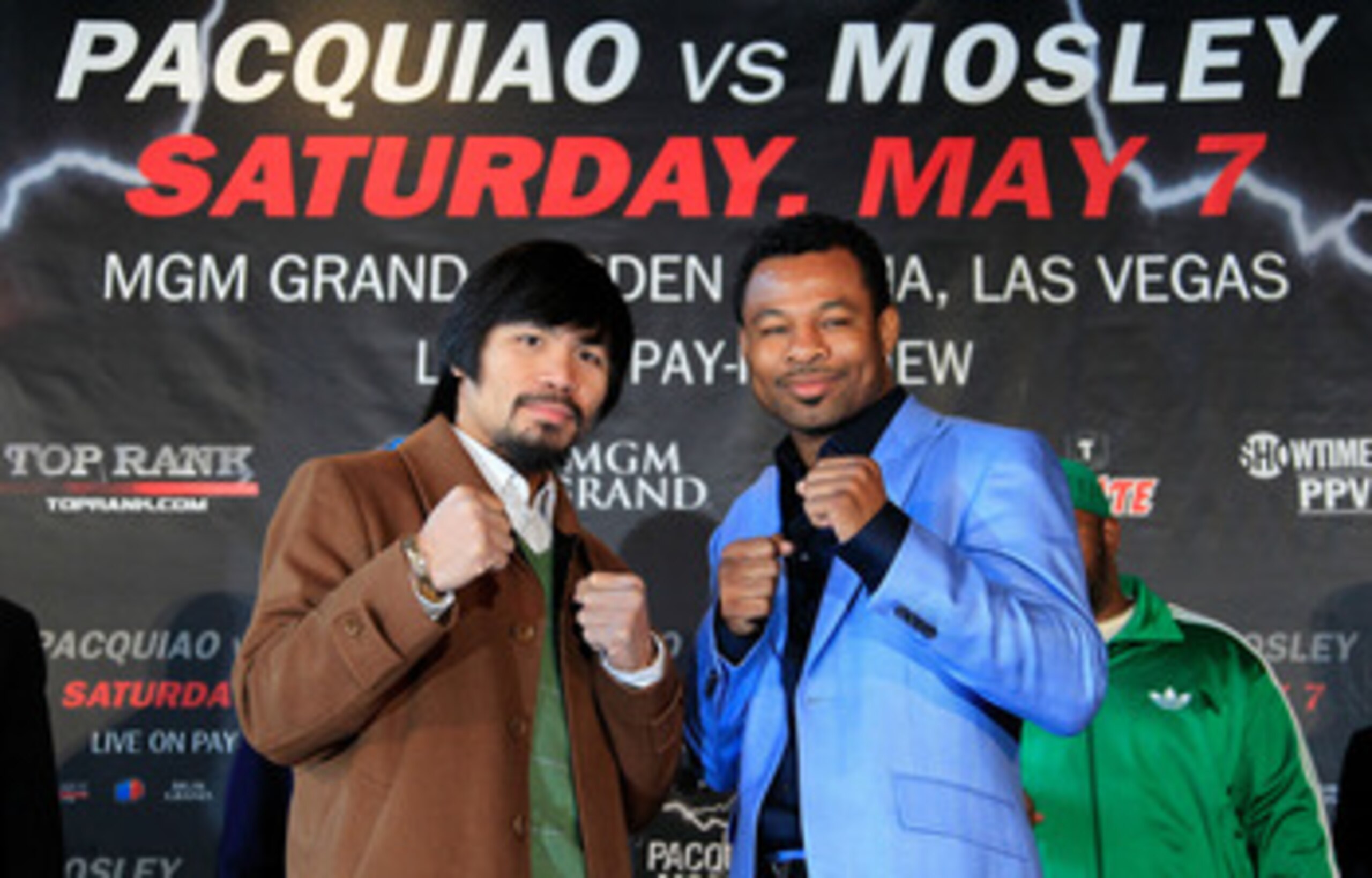 NEW YORK, NY - FEBRUARY 14:  Manny Pacquiao (L) and Shane Mosley pose for photographs to promote their upcoming fight at The Lighthouse at Chelsea Piers on February 14, 2011 in New York City.  (Photo by Chris Trotman/Getty Images)