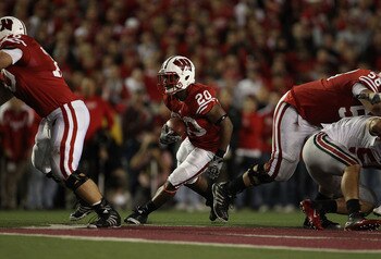 MADISON, WI - OCTOBER 16: James White #20 of the Wisconsin Badgers runs against the Ohio State Buckeyes at Camp Randall Stadium on October 16, 2010 in Madison, Wisconsin. Wisconsin defeated Ohio State 31-18. (Photo by Jonathan Daniel/Getty Images)