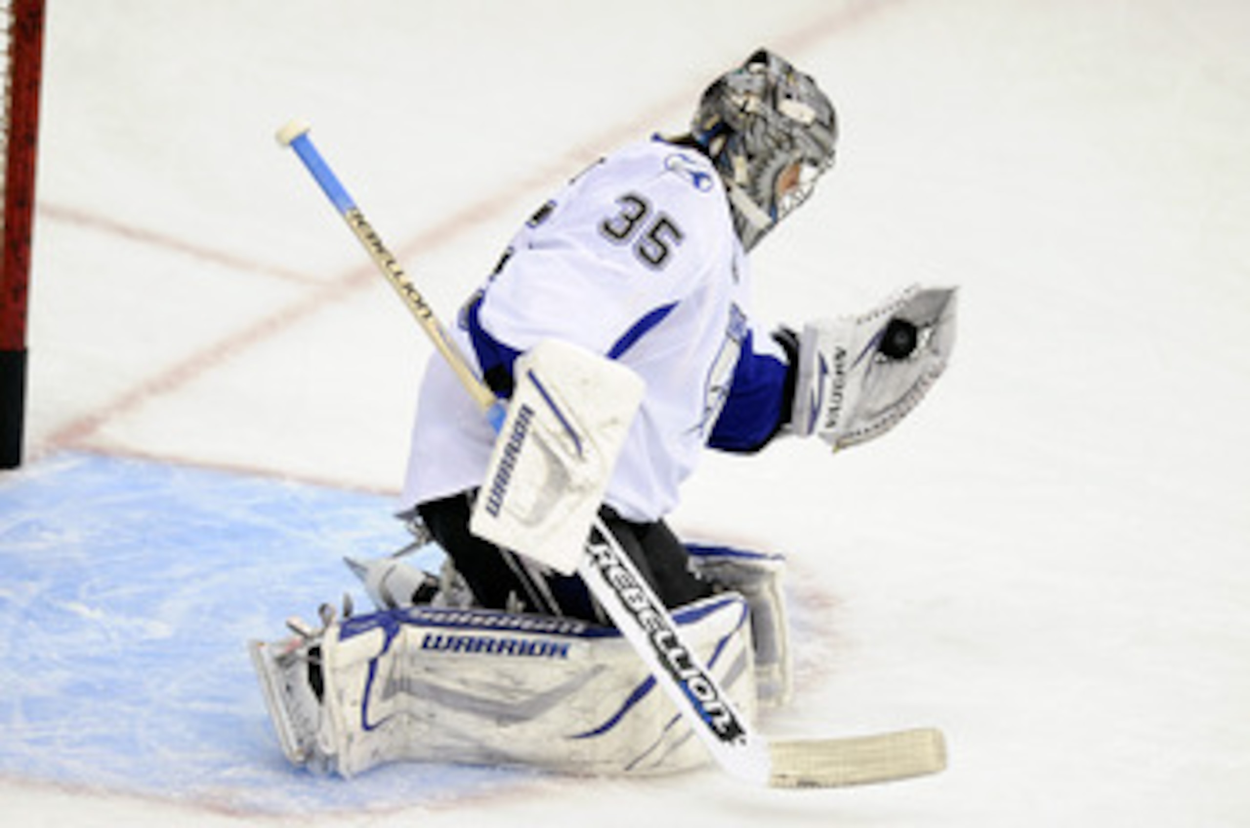 WASHINGTON, DC - APRIL 29:  Dwayne Roloson #35 of the Tampa Bay Lightning warms up before the game against the Washington Capitals in Game One of the Eastern Conference Semifinal during the 2011 NHL Stanley Cup Finals at the Verizon Center on April 29, 20